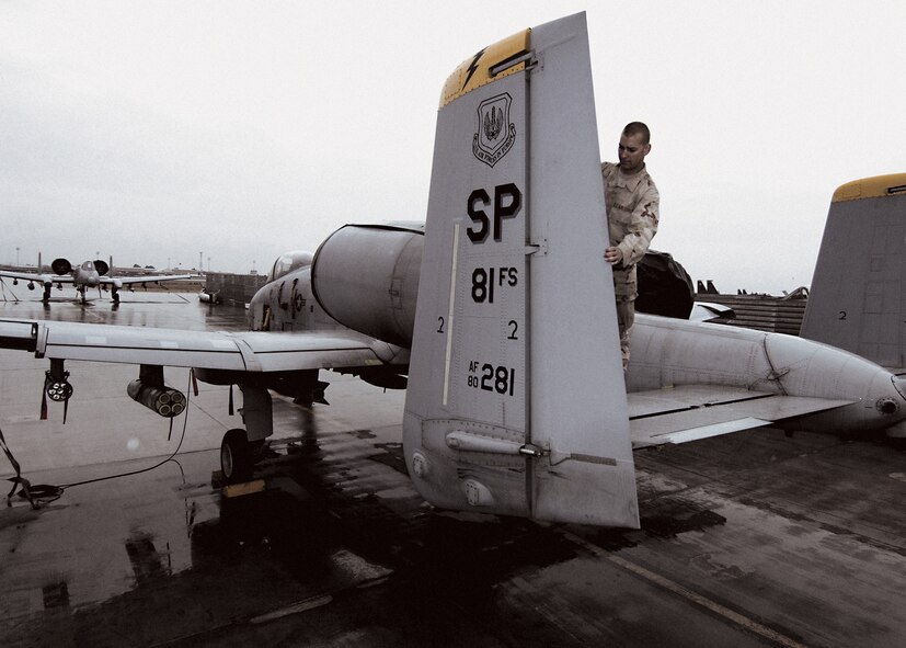 Crew chief Airman 1st Class Sean Story inspects the rudder of the oldest A-10 Thunderbolt II in U.S. Air Forces in Europe, in service since 1980.(U.S. Air Force photo by Master Sgt. Demetrius Lester)