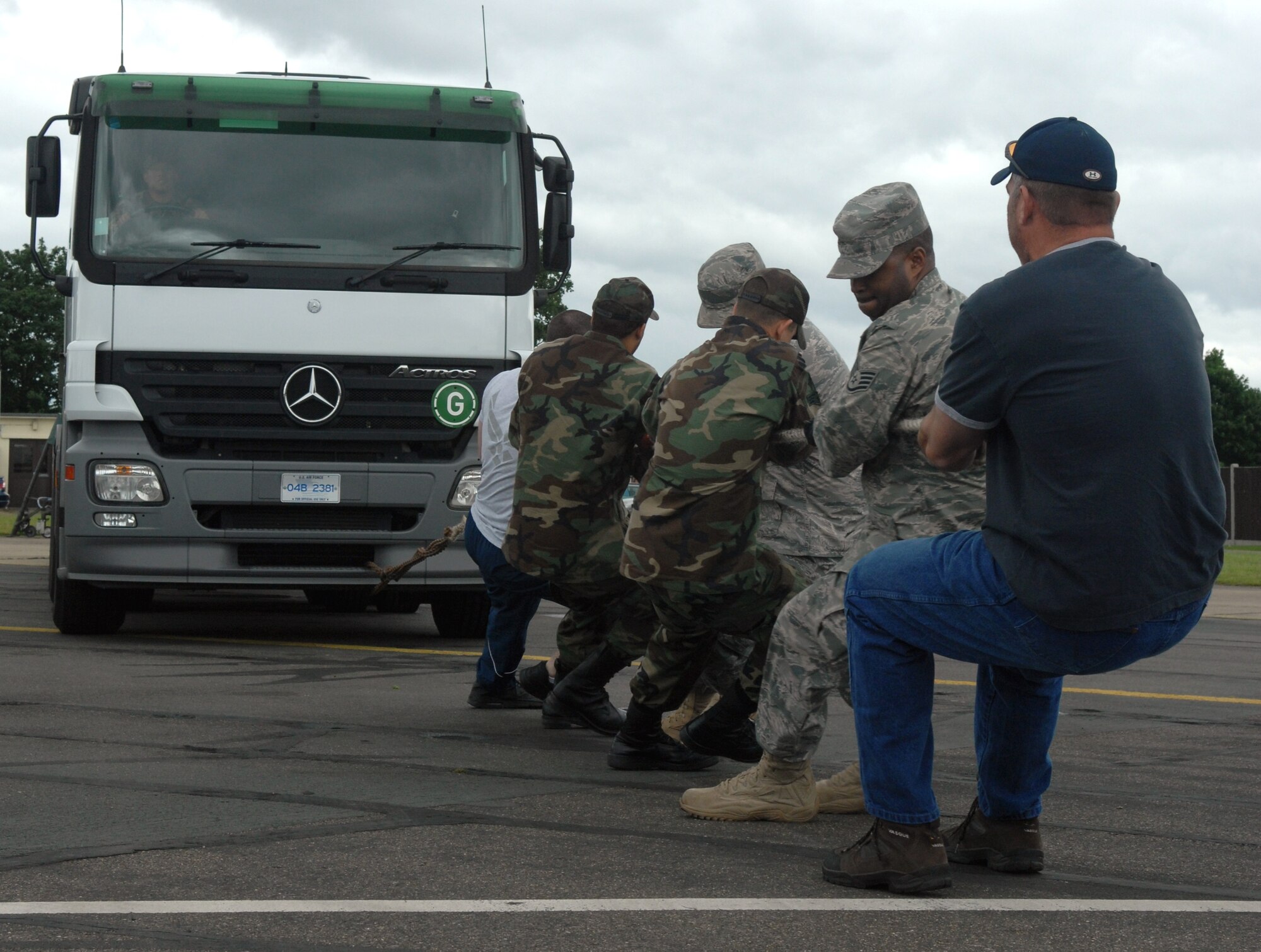 RAF MILDENHALL, England -- Airmen of the 100th Logistics Readiness Squadron Vehicle Operations Flight compete in the "tractor pull" June 12 as part of Loggie Days, a competition designed to bring members of the 350-person squadron closer together.  (U.S. Air Force photo by Senior Airman Heather K. Stidham)