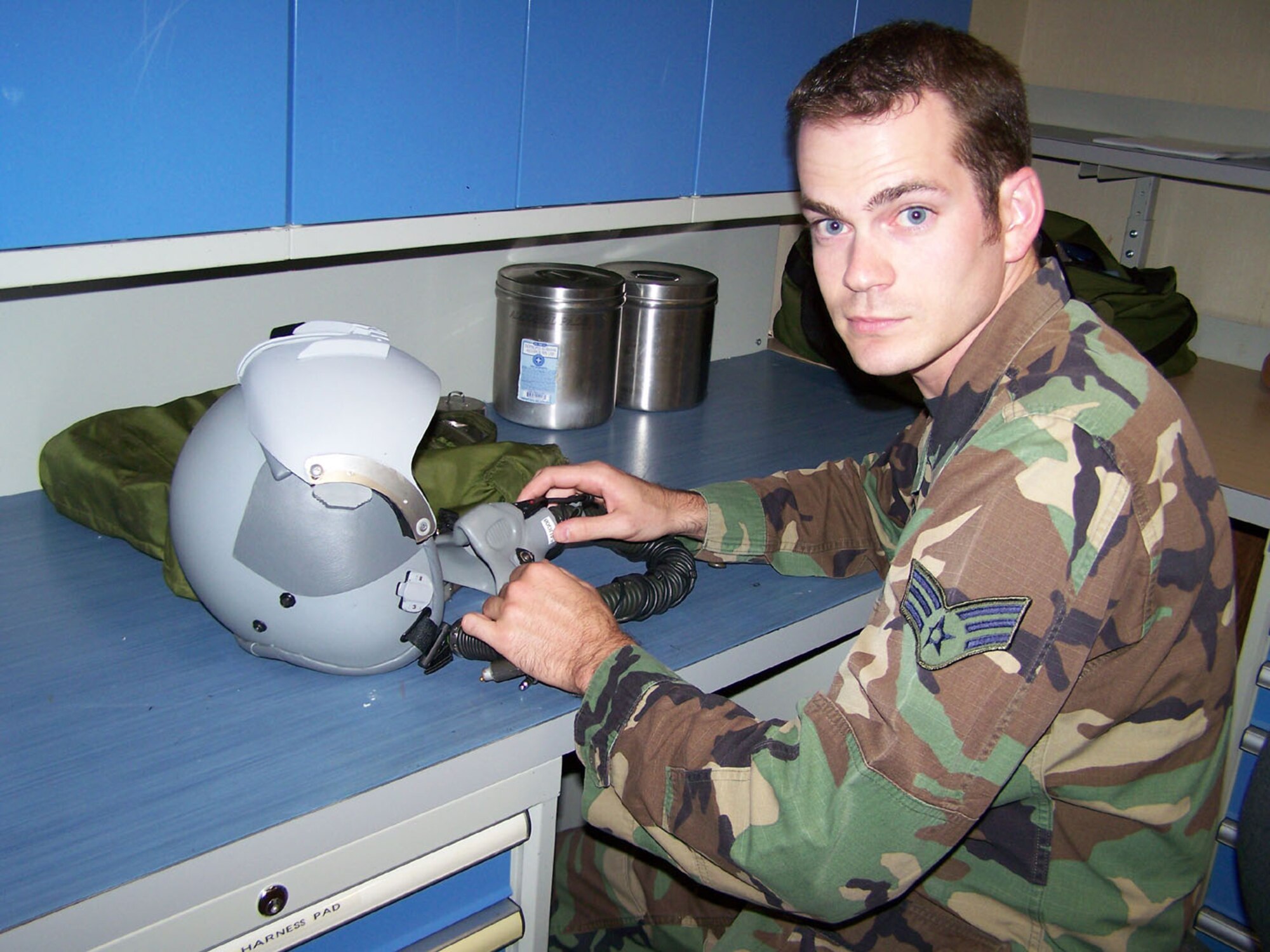 SEYMOUR JOHNSON AIR FORCE BASE, N.C. -- Senior Airman Dustin Fink disassembles an aircrew helmet in order to properly inspect the mask. Airman Fink is a new Reservist with the 916th Air Refueling Wing and works in the 916th Operations Support Flight as an aircrew flight equipment technician. U.S. Air Force photo/TSgt. Ian Gardner