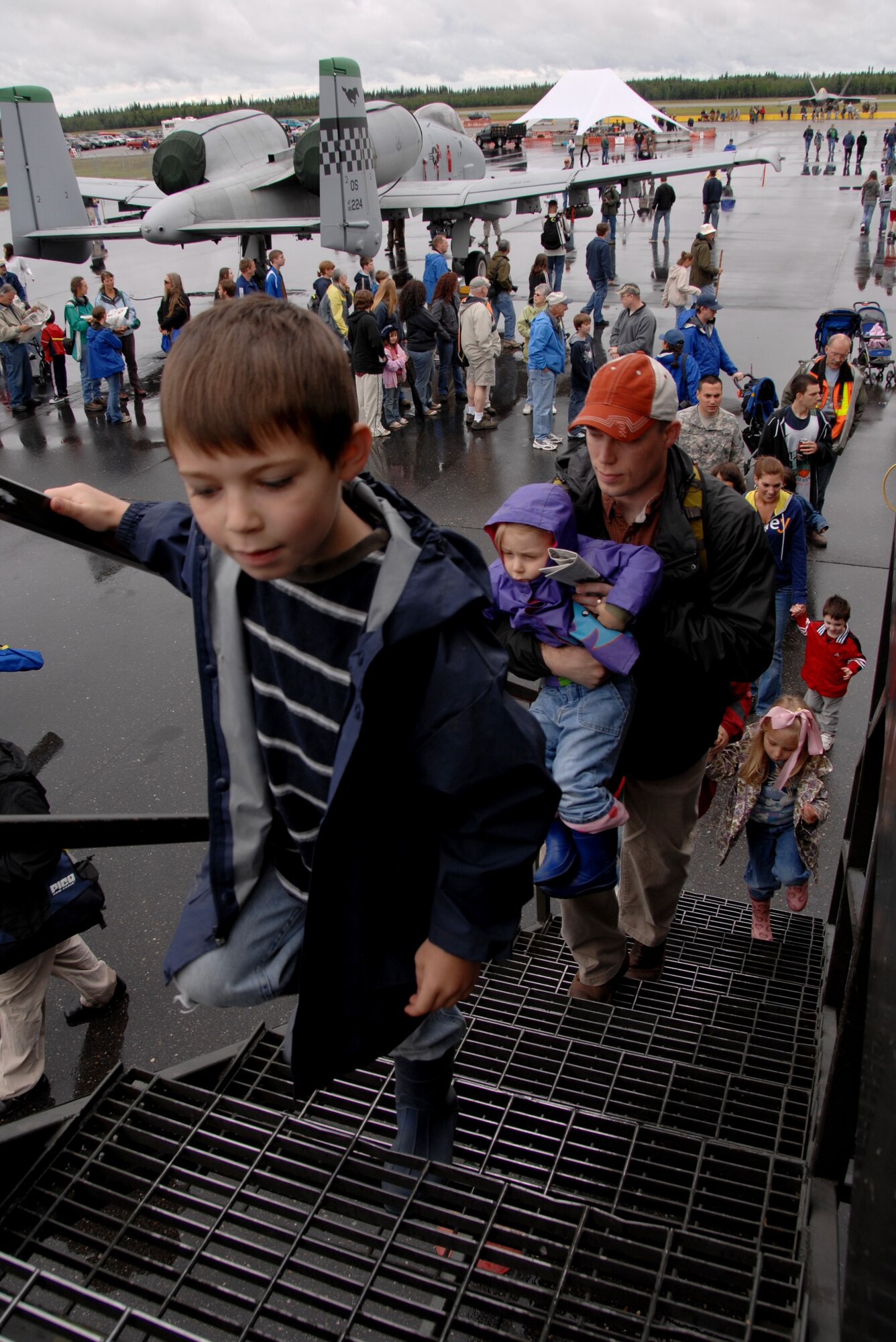 "Come on lets go !" exclaimed seven-year-old North Pole resident Ian Roberts to his parents as they board a KC-135 Stratotanker for a tour of the aircraft's interior during the Eielson Air Force Base "Soaring into Soltice" Thunderbirds show on June 24, 2008.  The Eielson AFB Alaska, airshow allowed the citizens of the surrounding towns get an up close view and demonstration of the capabilities of the Air Force's aircraft. The show hightlight was a performance by the USAF Thunderbirds.

(U.S Air Force photo by Tech Sgt. Eric T. Sheler)