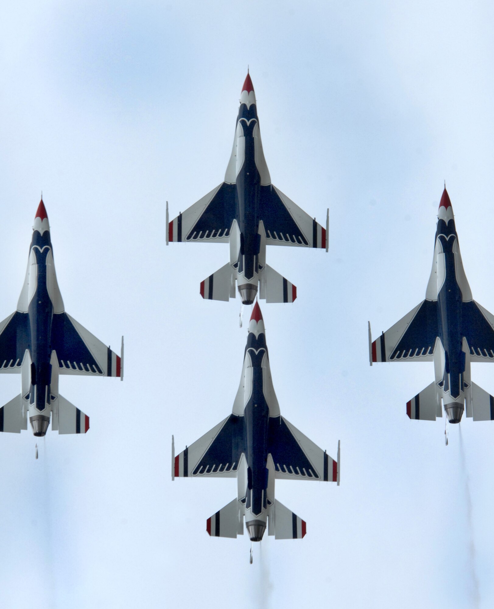 Four of the six Air Force Thunderbird F-16 performance aircraft fly together in a tight formation for the 6,000 + spectators during the Eielson Air Force Base  Alaska, "Soaring into Soltice" Thunderbirds show on June 24th, 2008. The "Soaring into Soltice" airshow provided an opportunity for the local community to visit and  get an up close view and demostration of the capabilities of the Air Force's aircraft.

(U.S Air Force photo by Tech Sgt. Eric T. Sheler)