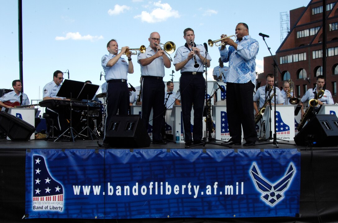 HANSCOM AFB, Mass. – Members of the Air Force Band of Liberty’s Big Band ensemble perform alongside Byron Stripling (right), internationally acclaimed trumpeter, as part of Boston’s ParkARTS Waterfront Concert Series at Christopher Columbus Park June 21. (U.S. Air Force photo by Linda LaBonte Britt.)