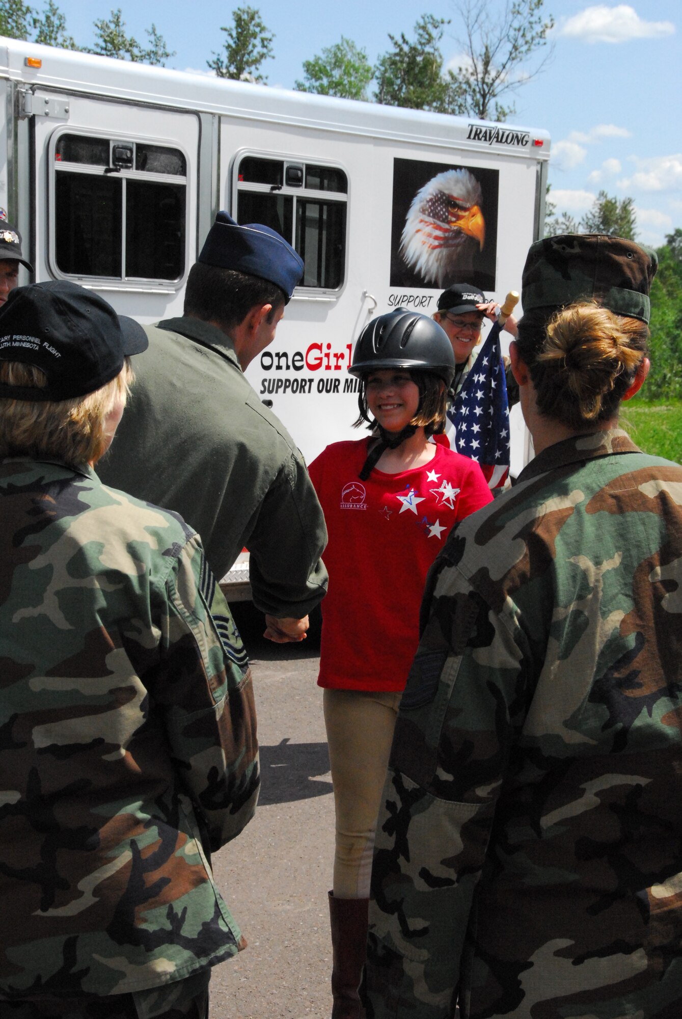 E'leese Madgett Manrique, 12 years old, stops at the 148th Fighter Wing, Duluth, Minn. to meet with wing members on June 23, 2008.  E'leese is riding her horse across Minn. trying to raise $15 million to start a ranch for veterans and military members.  (U.S. Air Force photo by Tech. Sgt. Jason W. Rolfe)  (Released)