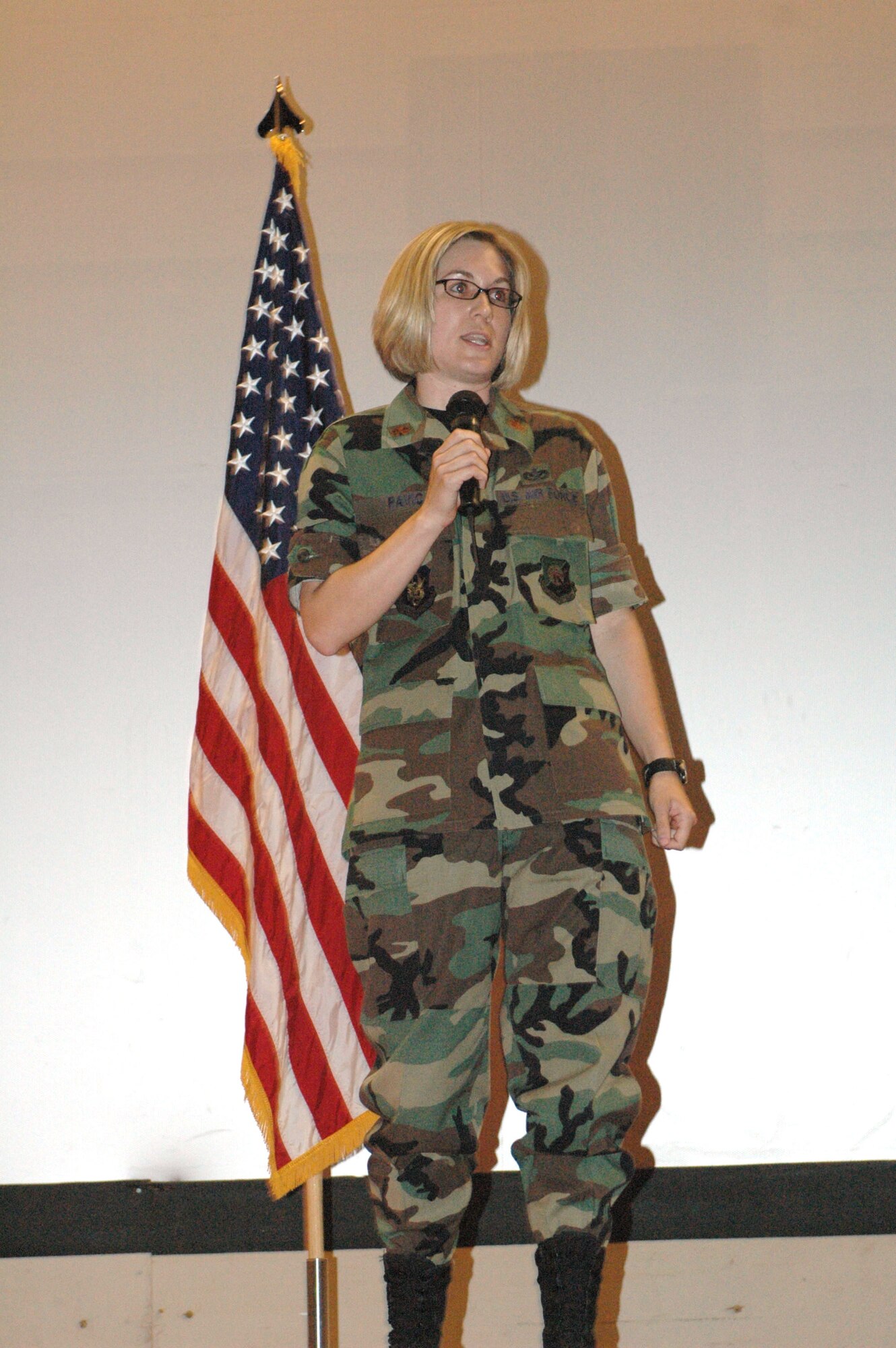 Maj Cheryl Pavic addresses the audience after assuming command of the 512th Civil Engineer Squadron in ceremony at the base theater June 22. Major Pavic was formerly assigned to the 940th Civil Engineer Squadron at Beale Air Force Base, Calif.  (U.S. Air Force photo/ Senior Airman Sasha S. Skrine)