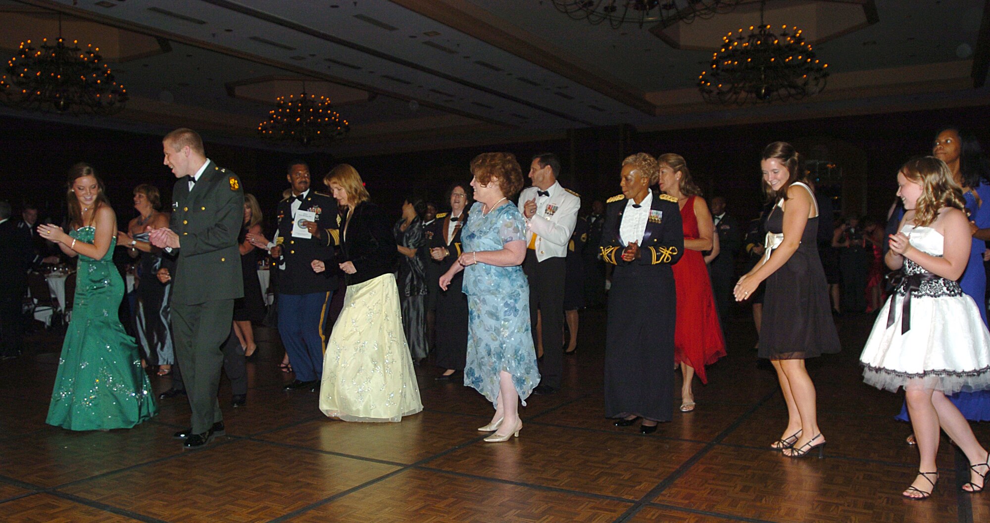 SCOTT AIR FORCE BASE, Ill. -- Guests at the 2008 Army Birthday Ball gather on the dance floor for the "Electric Slide." 
(photo/Mike Petersen)