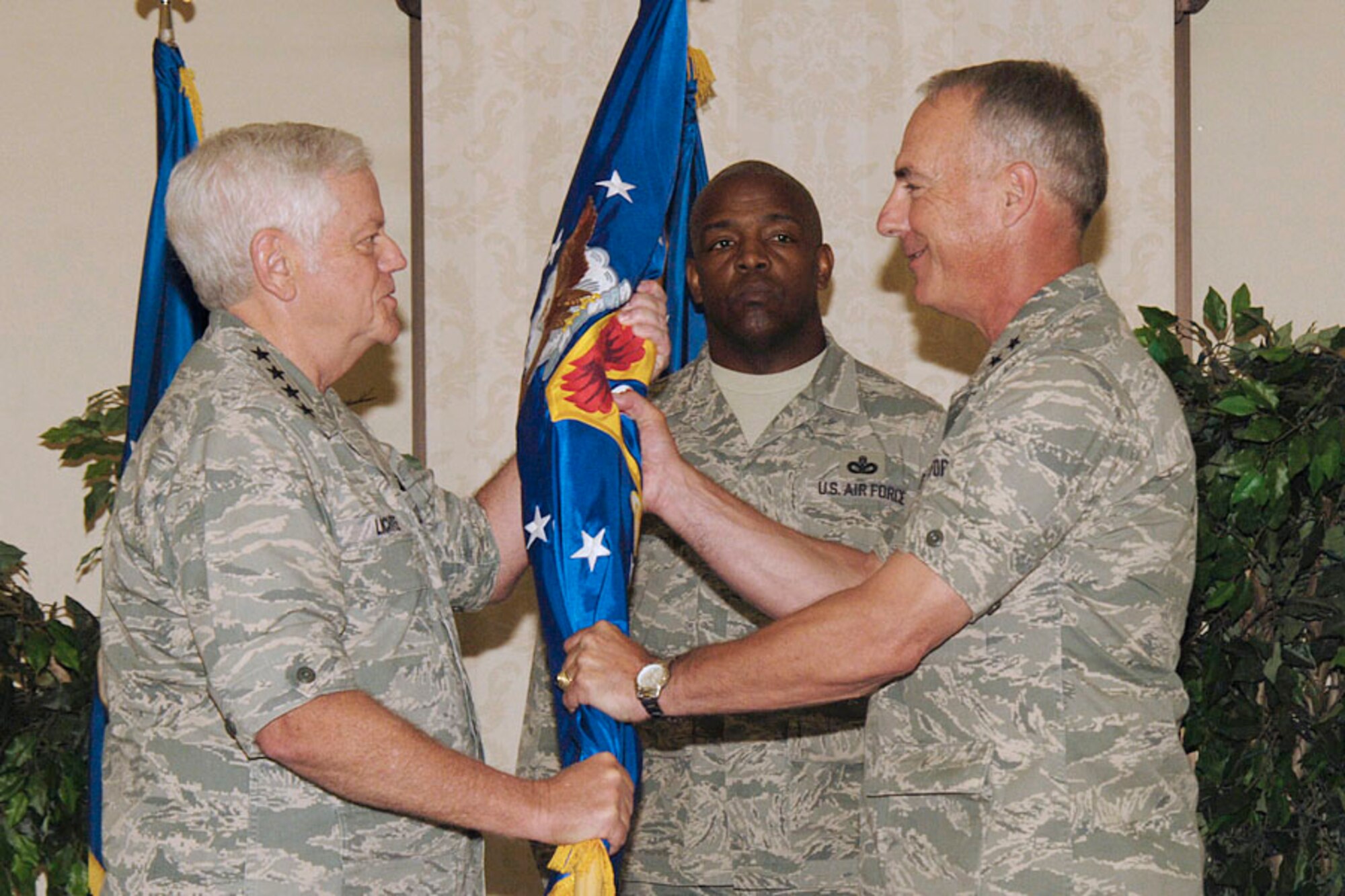 SCOTT AIR FORCE BASE, Ill. -- Maj. Gen. Winfield W. Scott III  (right) assumes command of the 18th Air Force from Gen. Arthur J. Lichte, Air Mobility Command commander, during the change of command ceremony at the Scott Club Tuesday. General Scott is replacing Maj. Gen. James A. Hawkins. 
(US Air Force photo/Senior Airman Jonathan Lovelady)
