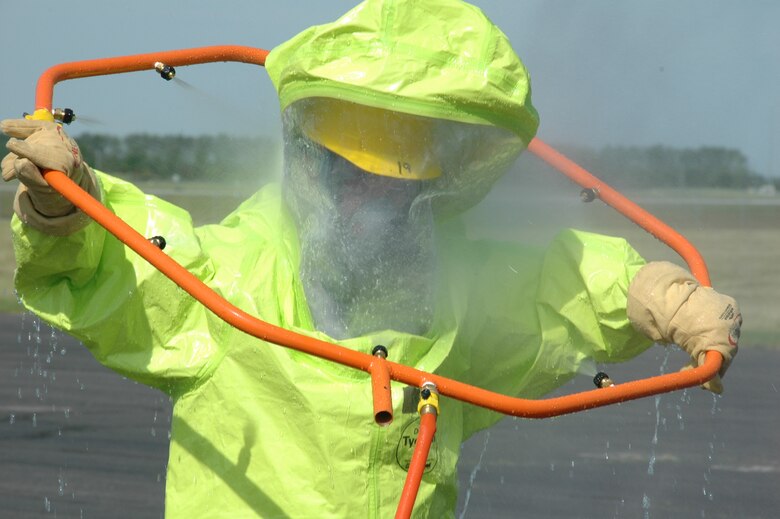 Airmen go through decontamination procedures during Emergency Management Training hosted at the 119th Wing, N.D. Air National Guard on Monday, June 23, 2008.  

Photo taken by SMSgt David Lipp, 119th Wing