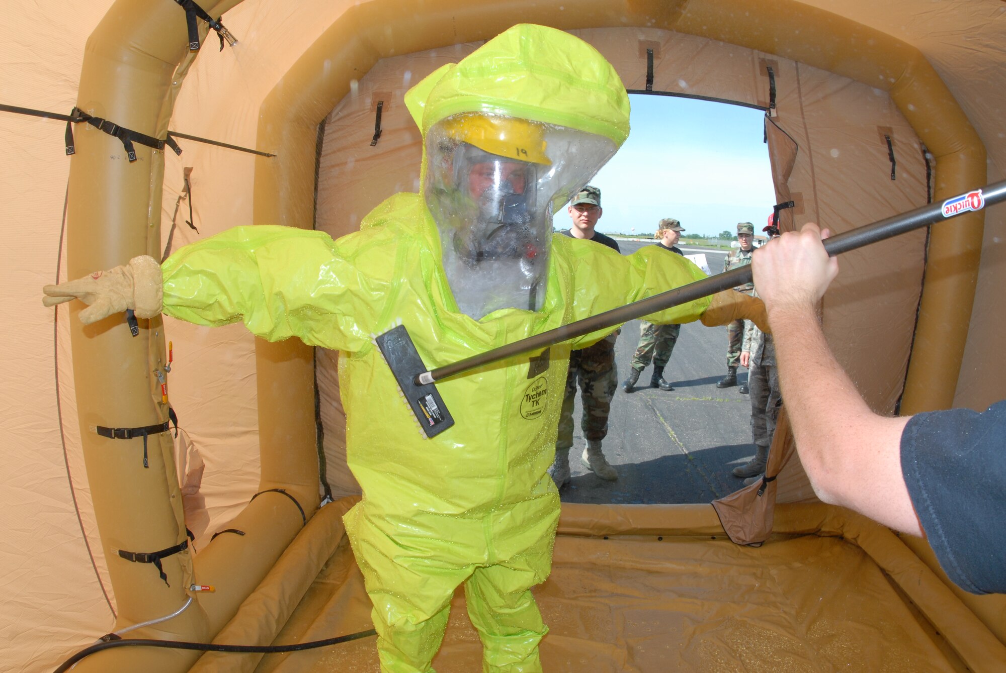 Airmen go through decontamination procedures during Emergency Management Training hosted at the 119th Wing, N.D. Air National Guard on Monday, June 23, 2008.  

Photo taken by SMSgt David Lipp, 119th Wing