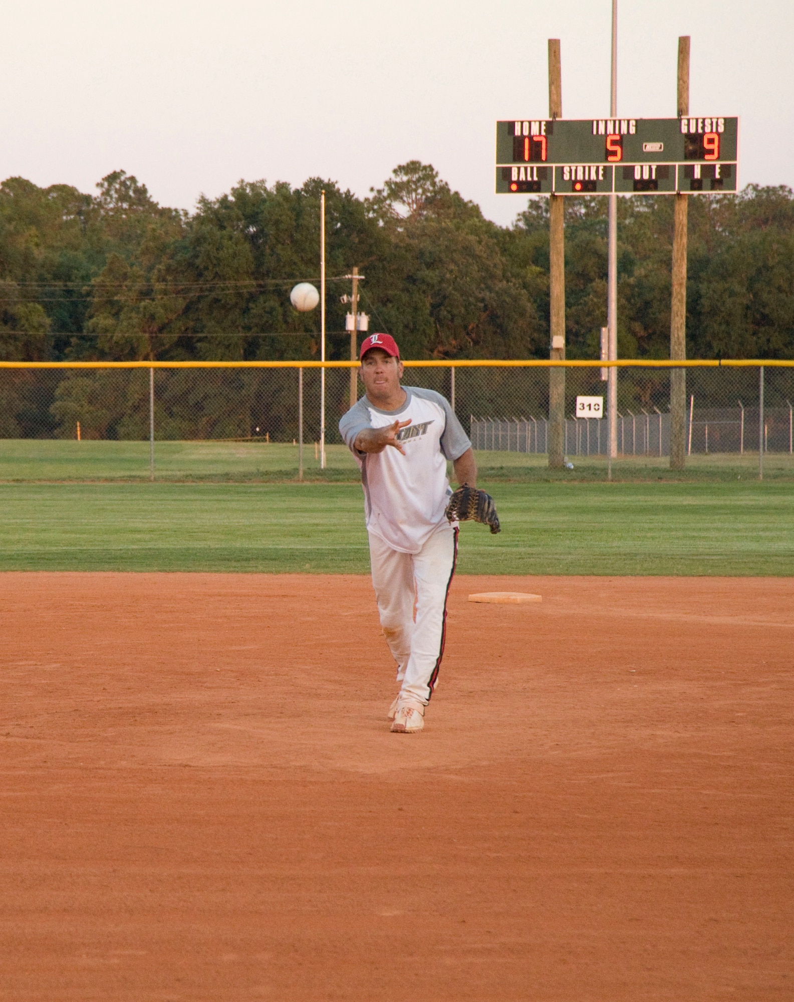 EGLIN AIR FORCE BASE, Fla. -- Ron Mann, a refueling unit operator with the 96th Logistics Readiness Squadron, pitches during the Eglin Intramural Softball Championship game. The 1st Special Operations Maintenance Squadron declared victory with a score of 29-11. (U.S. Air Force photo by Wendell Rowan)