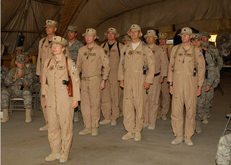 BAGRAM AIR FIELD, Afghanistan -- Members of the 455th Expeditionary Operations Group stand in formation under the command of Col. Carol Timmons, 455 EOG deputy commander, here June 21. The group comprised of more than 700 personnel executes combat missions on behalf of the wing and Joint/Coalition forces. (U.S. Air Force photo by Master Sergeant Demetrius Lester)