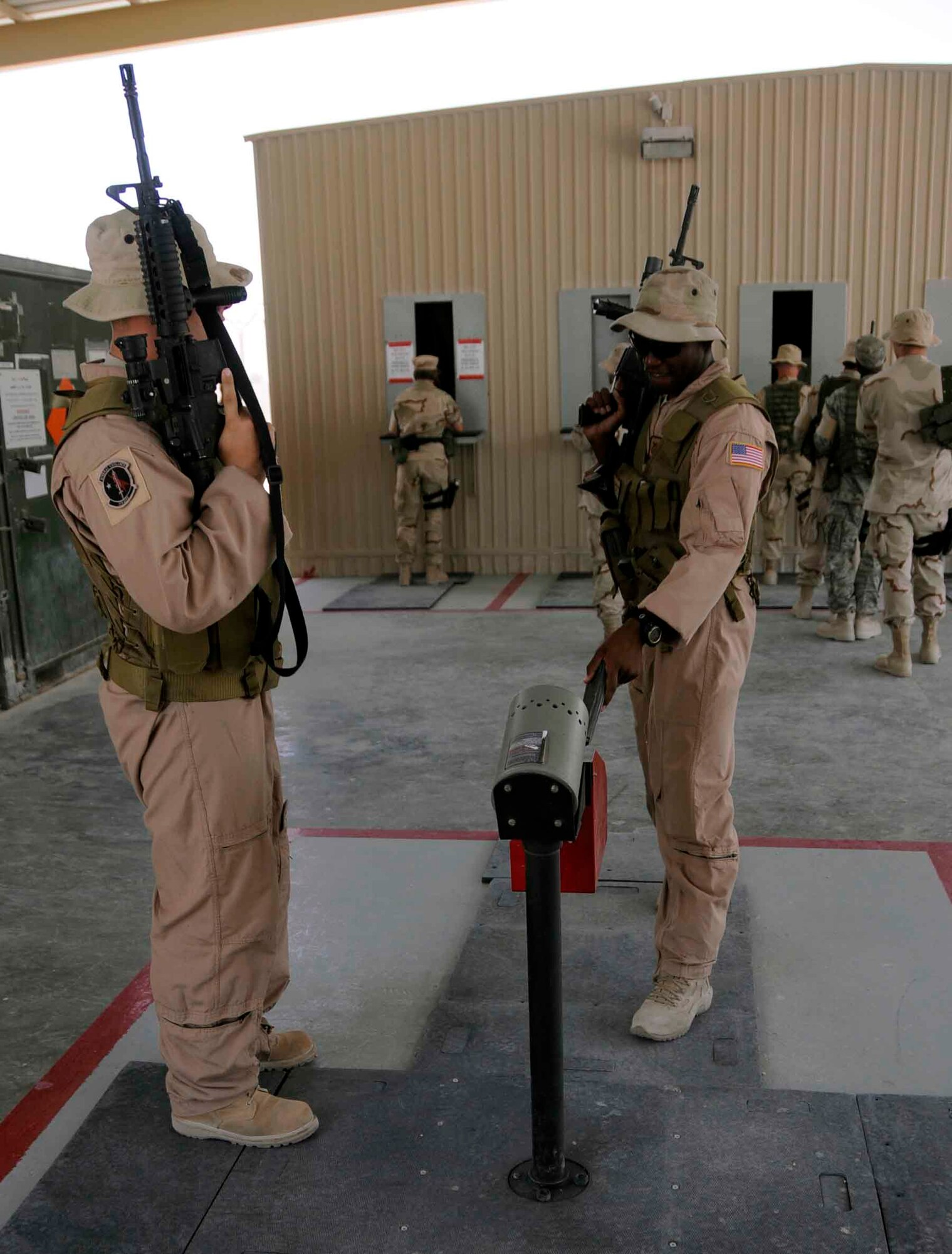 SOUTHWEST ASIA—Staff Sgt. Nahteas Murphy puts an M16 magazine down to perform clearing procedures after a mission June 24. Sergeant Murphy belongs to the 379th Expeditionary Security Forces Squadron's Fly Away Security Team (U.S. Air Force photo Senior Airman Domonique Simmons)