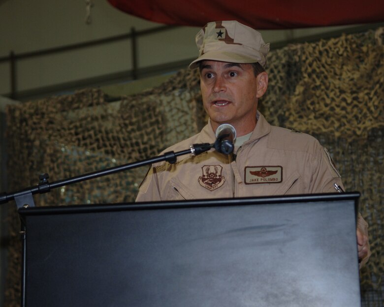 Brig. Gen. H.D. Polumbo, Jr., 380th Air Expeditionary Wing commander, speaks during the change of command ceremony,  June 16. (U.S. Air Force photo/Airman 1st Class Kelly LeGuillon)
