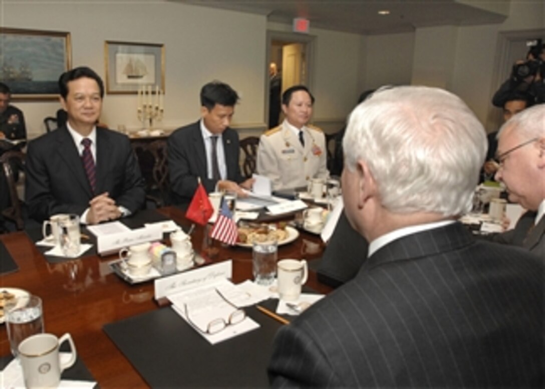 Vietnamese Prime Minister Nguyen Tan Dung (left) meets with Secretary of Defense Robert M. Gates (right) in the Pentagon on June 24, 2008.  Under discussion is a range of regional security issues of mutual interest to both nations.  