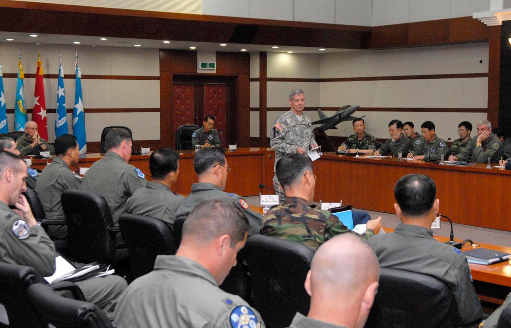Air Boss conference participants listen to a briefing from the United States Forces - Korea Commander Gen. .Walter (Skip) Sharp, here June 26.
