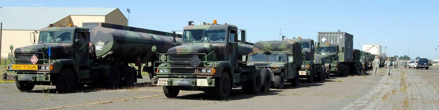 FAIRCHILD AIR FORCE BASE, Wash. – U.S. Army Reserve 353rd Transportation Company fuel trucks from Buffalo, Minn., prepare to receive here June 17. The 353rd TC participated in a eight-day exercise which led a convoy of 39 vehicles from Minnesota to Washington and back. The exercise focused on fuel transporting procedures for upcoming deployments. (U.S. Air Force photo/Staff Sgt. JT May III)