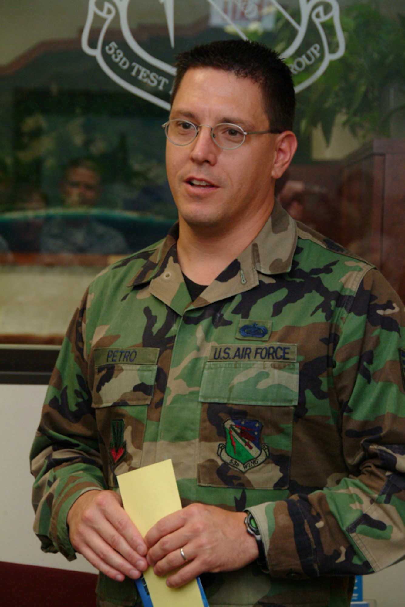 Tech Sgt. Steve Petro, 53d Wing Staff, thanks the Chief's Group after being chosen for the Sharp Troop Award June 25 at Eglin Air Force Base, Fla.  Sergeant Petro, who was notified he made master sergeant the following day, is the executive assistant to the 53d Wing command chief.  The Chiefs Group gives out the sharp troop award 53 times a year.  Three members of the 53d Wing have won them so far in 2008.  Photo by Staff Sgt. Samuel King Jr.