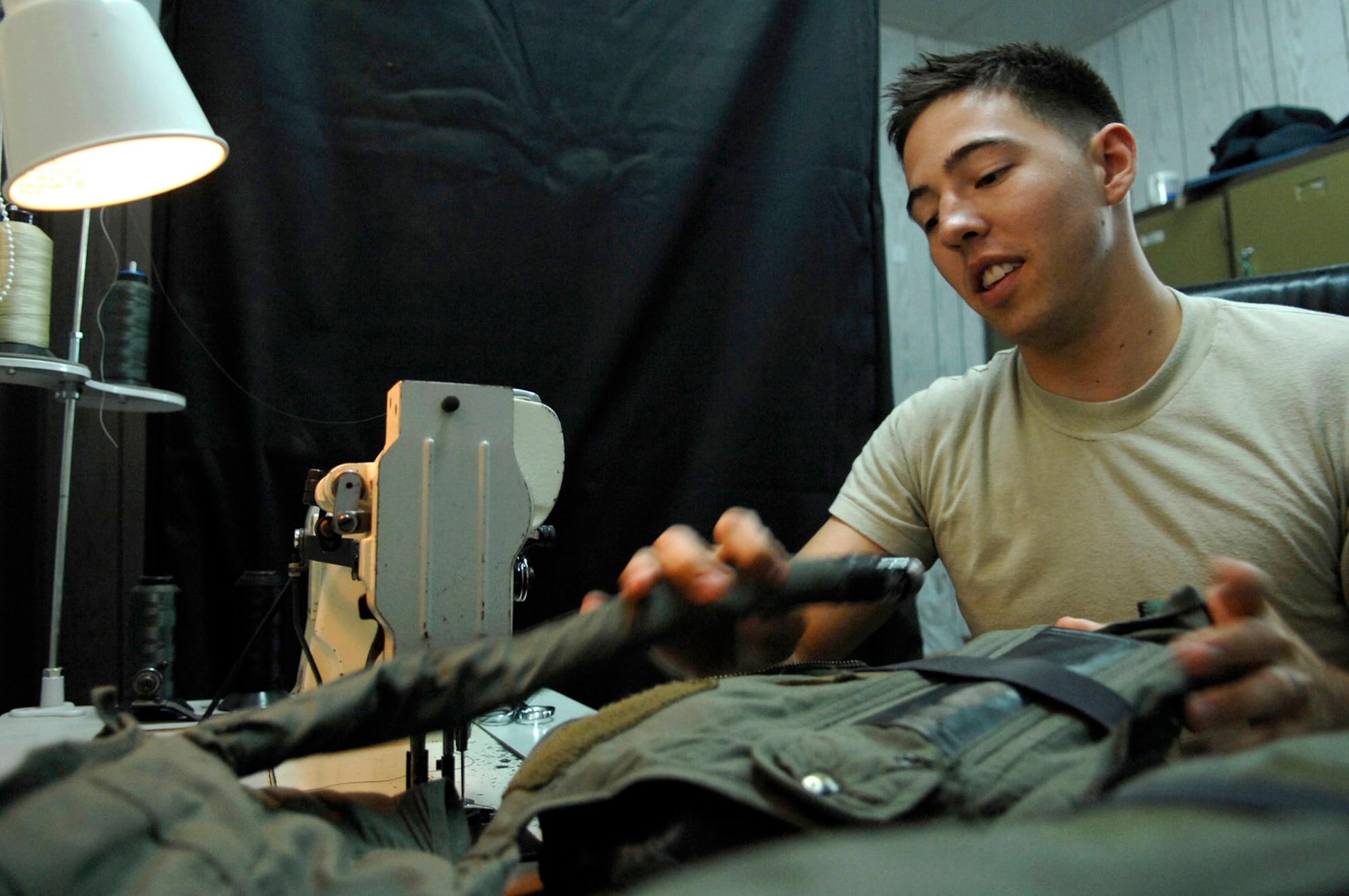 Senior Airman Nicholas Sanders inspects for tears and holes in an anti-G suit June 23 at Joint Base Balad, Iraq. The suit is worn by F-16 Fighting Falcon pilots to combat the gravitational forces experienced during high-speed maneuvers. The suit prevents blood from rushing rapidly out of the brain, helping the pilot to maintain consciousness during flight. The technicians are responsible for the maintenance and operability of all the F-16 pilot gear, including their helmets and survival equipment. Airman Sanders is a 77th Expeditionary Fighter Squadron aircraft equipment technician deployed from Shaw Air Force Base, S.C. (U.S. Air Force photo/Senior Airman Julianne Showalter) 