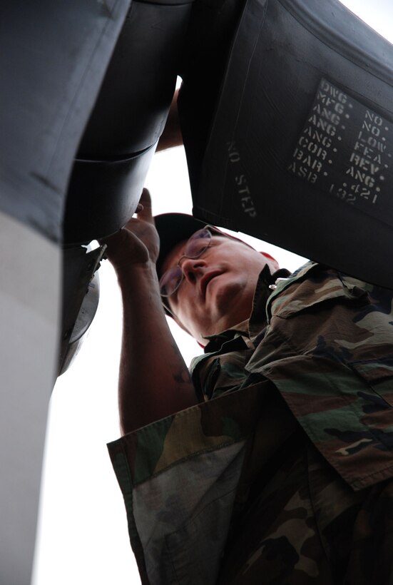 Maintainers take over when operations cease Tech. Sgt. Robert Burton, a C-130 Hercules aircraft maintainer, performs a filter replacement on an engine June 25 at Chino Municipal Airport, Chino, Calif. Sergeant Burton is joined by members of his North Carolina-based Air National Guard unit, the 145th Airlift Wing in support of firefighting missions throughout California. The 145th AW and its Airmen are assigned to the 302nd Air Expeditionary Group at the Chico airport. (U.S. Air Force photo/Senior Airman Stephen Collier)
