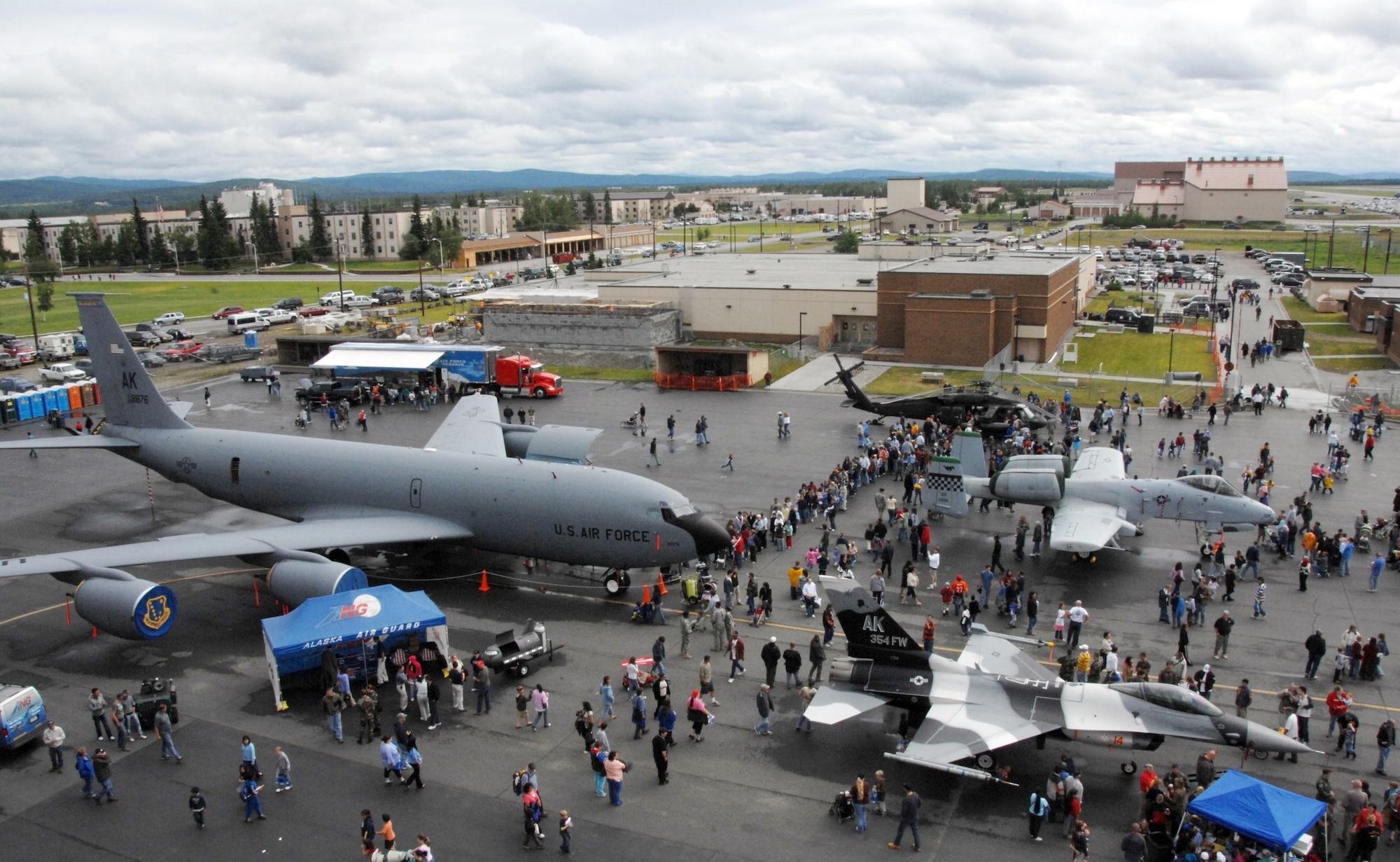 An estimated 6,000 people tour aircraft during the June 24 airshow at Eielson Air Force Base, Alaska. The "Soaring into Soltice" airshow provided an opportunity for the local community to visit and get an up close view and demostration of the capabilities of the Air Force's aircrafts. (U.S. Air Force photo/Tech Sgt. Eric T. Sheler) 
