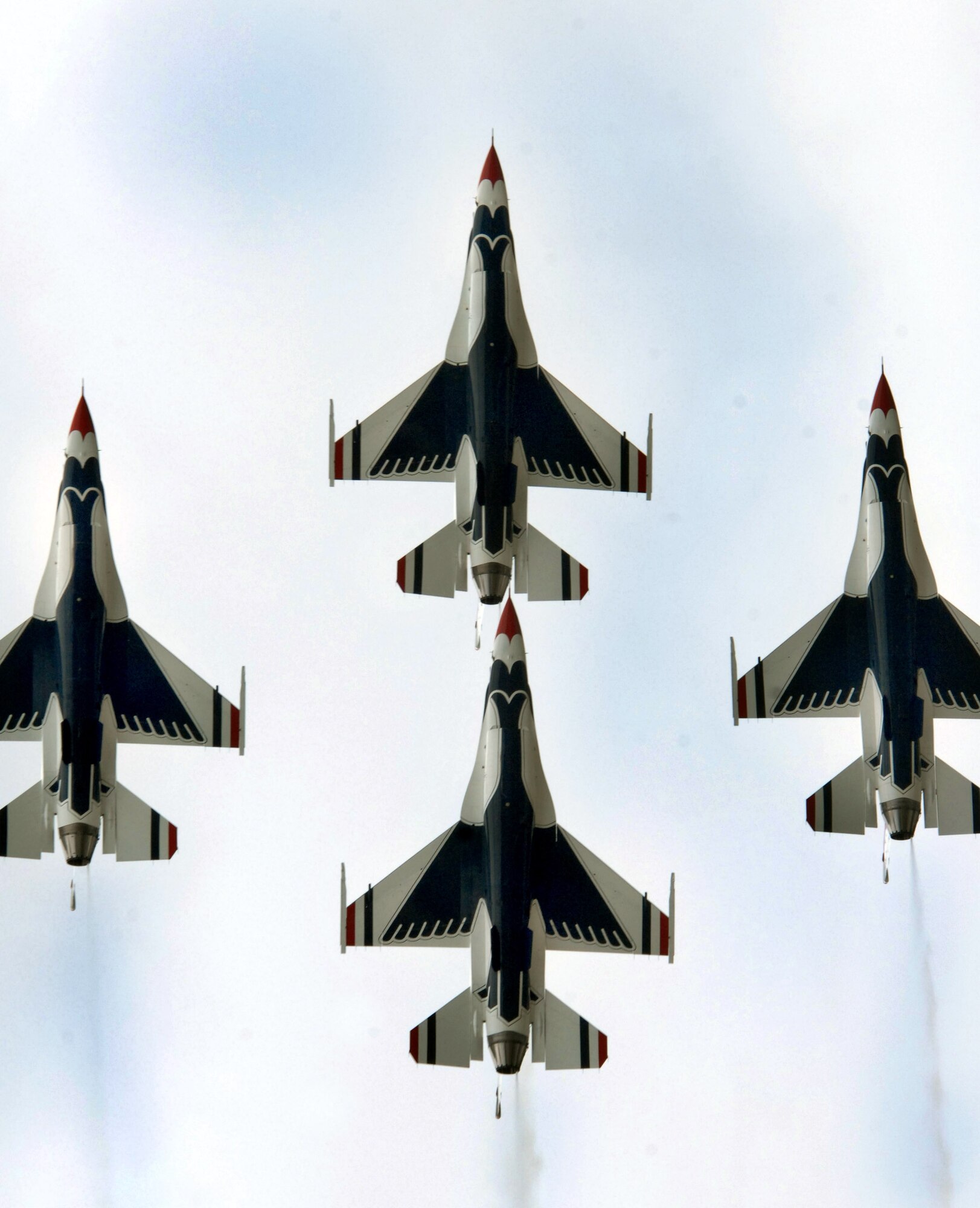 Four Air Force Thunderbird F-16 Fighting Falcons fly together in formation for more than 6,000 spectators during the June 24 airshow at Eielson Air Force Base, Alaska. The "Soaring into Soltice" airshow provided an opportunity for the local community to visit and get an up close view and demostration of the capabilities of the Air Force's aircraft. (U.S. Air Force photo/Tech Sgt. Eric T. Sheler) 