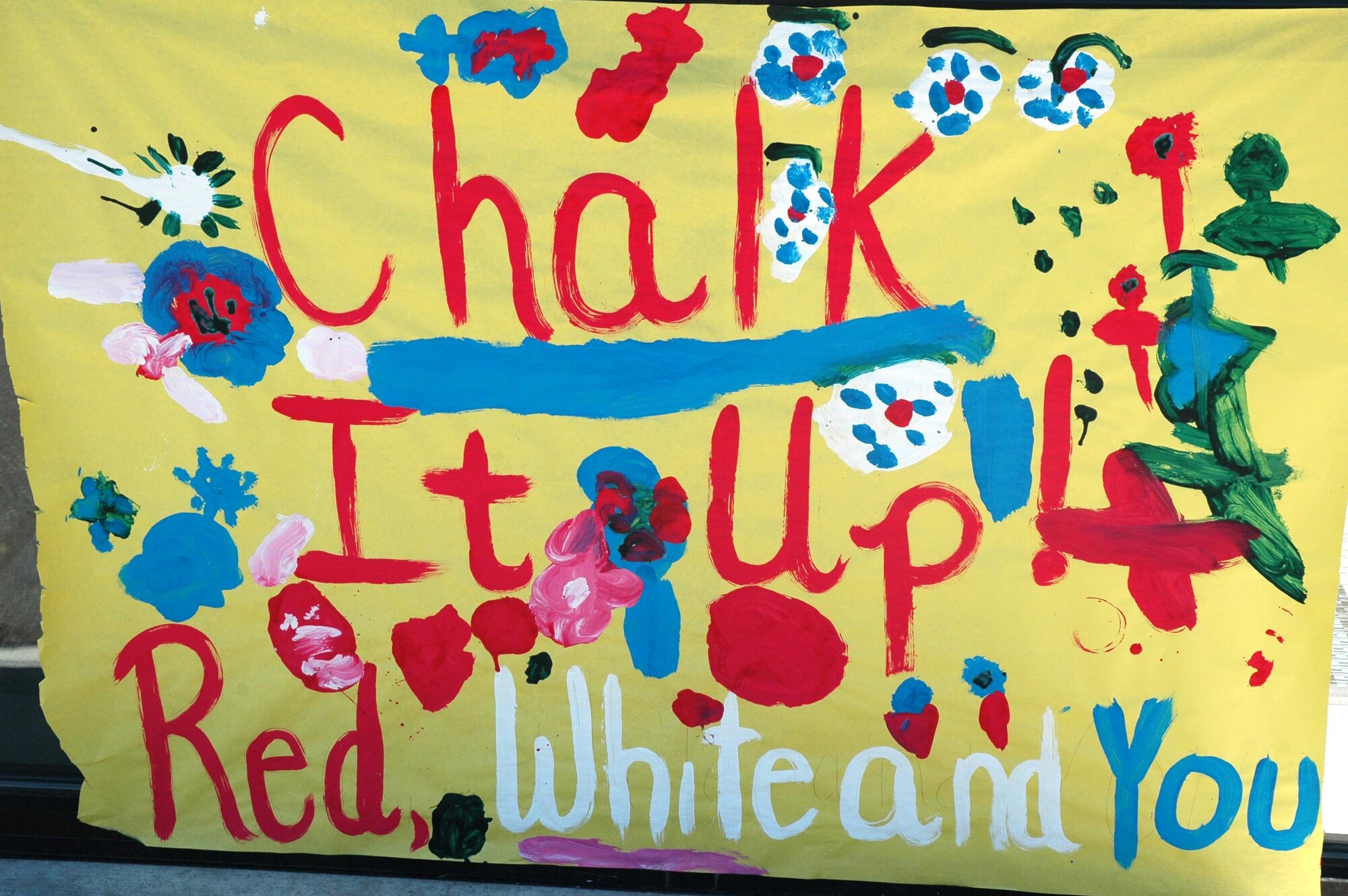The Youth Program Center hosted the annual Chalk-it-Up! competition Wednesday. Children and adults created chalk artwork on the sidewalk and parking lot at the YPC. (U.S Air Force photo/ Airman 1st Class Dillon White)