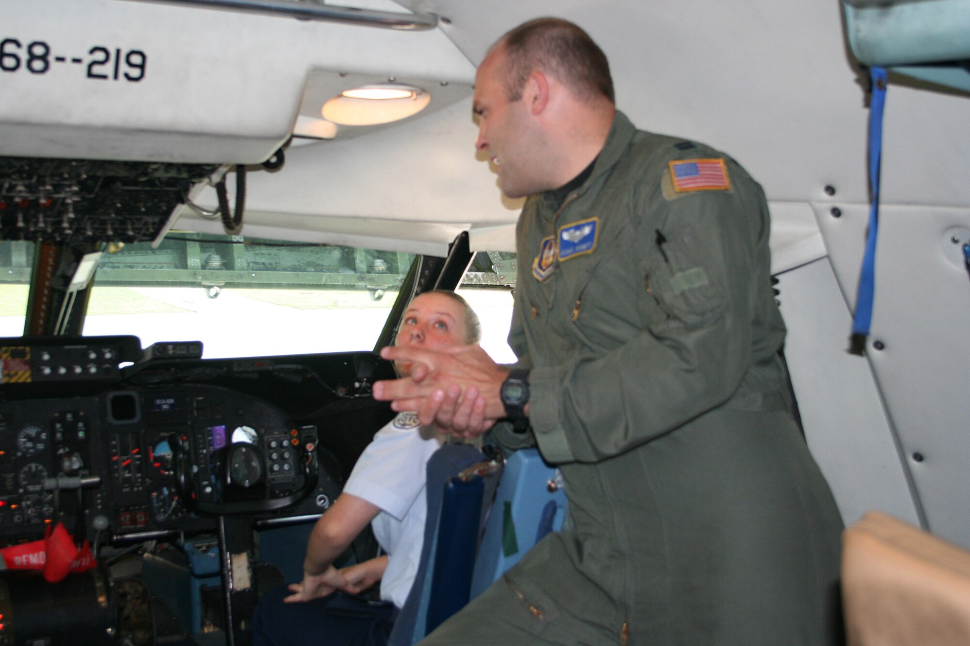 WRIGHT-PATTERSON AFB, Ohio - Capt. Mike Bennett, 89th Airlift Squadron speaks to Junior ROTC students during a recent tour of a 445th Airlift Wing C-5 Galaxy.  Approximately 130 JROTC students were participating in a leadership camp in the Dayton area and included a tour of Wright-Patterson AFB and the C-5 as part of their camp week. (U.S. Air Force photo/Laura Darden)