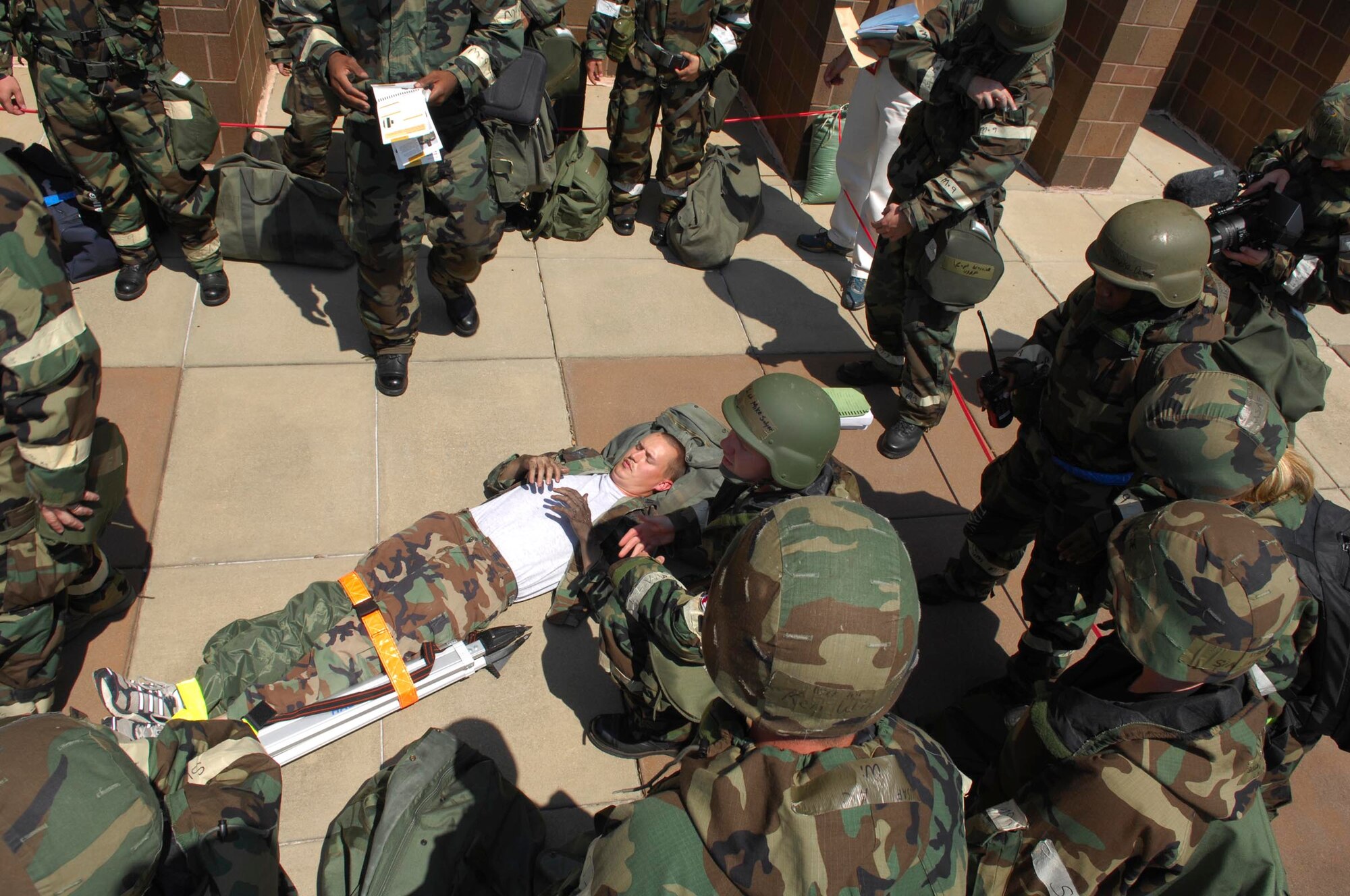 SHAW AIR FORCE BASE, S.C.-- Airman from the 20th Fighter Wing respond to a simulated burn and open fracture injury during a Phase II operational readiness exercise June 25. Operational Readiness Exercises provide vital training and prepare Airmen for worldwide deployment. (U.S. Air Force photo/Senior Airman William Coleman)