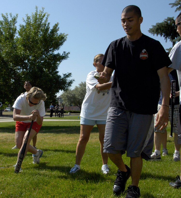 Senior Airman Jason Mendoza, DPB, participates in the egg race during the ARPC obstacle course June 27. The event raised $140 toward the ARPC summer picnic. The winning team was the DPB team of: Staff Sgts. Damien Pierce, Jason Burbach and Ramon Montoya, and Airman Mendoza. (U.S. Air Force photo/Mike Molina)                            