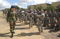 6/13/2008 - Air Force Academy Cadet Lt. Colonel Adam Williams reviews basic trainees while learning how to be a military training instructor through Lackland's Summer Leadership Program. The program allows cadets to observe actual training and get a better understanding of what day-to-day training is all about.
(USAF photo by Alan Boedeker)                       