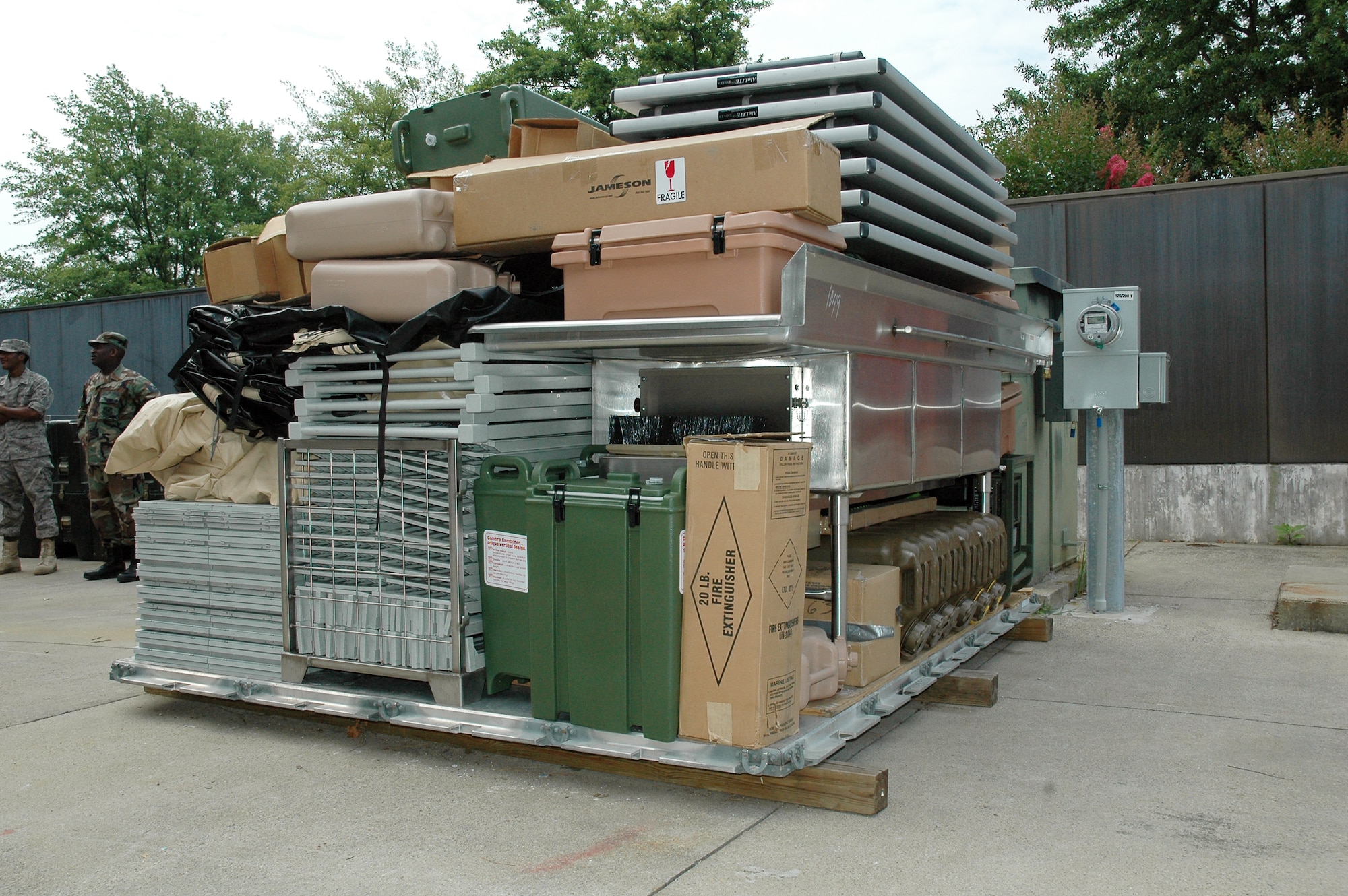 A pallet used for the Prime Readiness in Base Services traininig facility on base sits outside the 94th Services Squadron before being delivered to the field. Prime RIBS provide resources such as deployable kitchens used for peacetime and wartime contingencies. The pallet includes generators, trash cans, temper tents, and food burners. When assembled, the unit can provide field feeding for up to 550 people(U.S. Air Force photo/Erin Tindell).