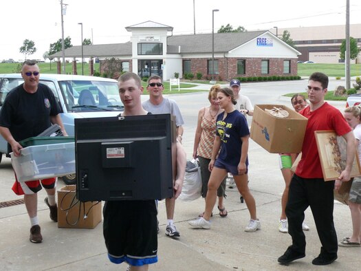 Team Offutt members help unload merchandise for the new Airman's Attic to
get ready for the grand opening June 30. Volunteers contributed over 1,600
man hours to prepare the new site. (Courtesy Photo) 
