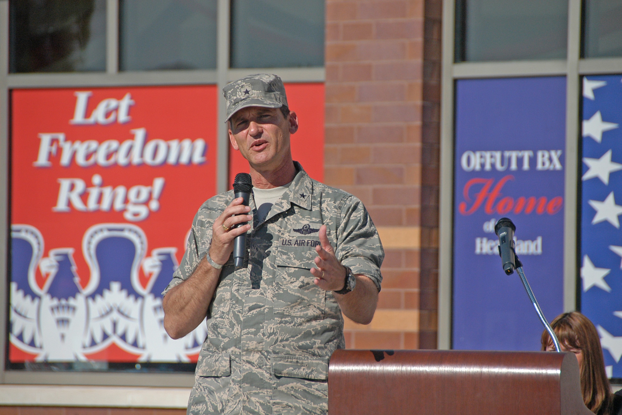 Brig. Gen. James Jones, 55th Wing commander, addresses the crowd during the grand opening of the new Army and Air Force Exchange Services base exchange June 13. (U.S. Air Force Photo By/Jeff Gates)