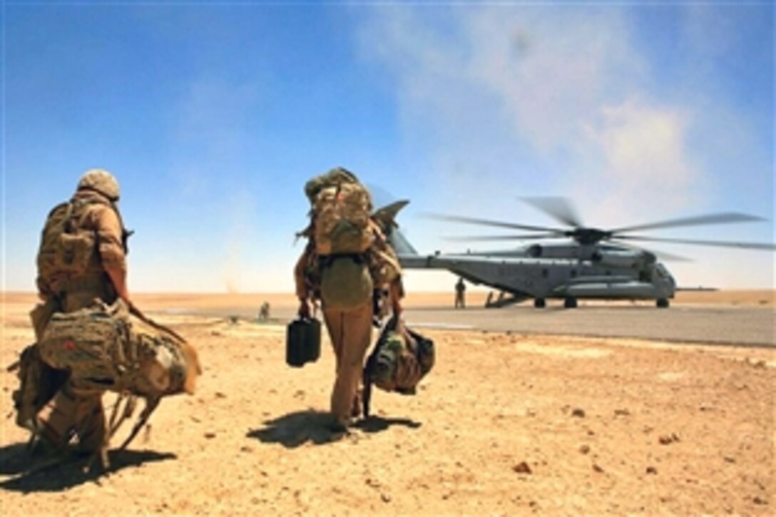 A U.S. Marine CH-53 Sea Stallion helicopter lands in the Jazeerah Desert, Iraq, to pick up Marines taking part in Operation Defeat al Qaeda in the North, June 24, 2008. They are part of the 3rd Marine Air Wing's Heavy Helicopter Sqaudron 462. 