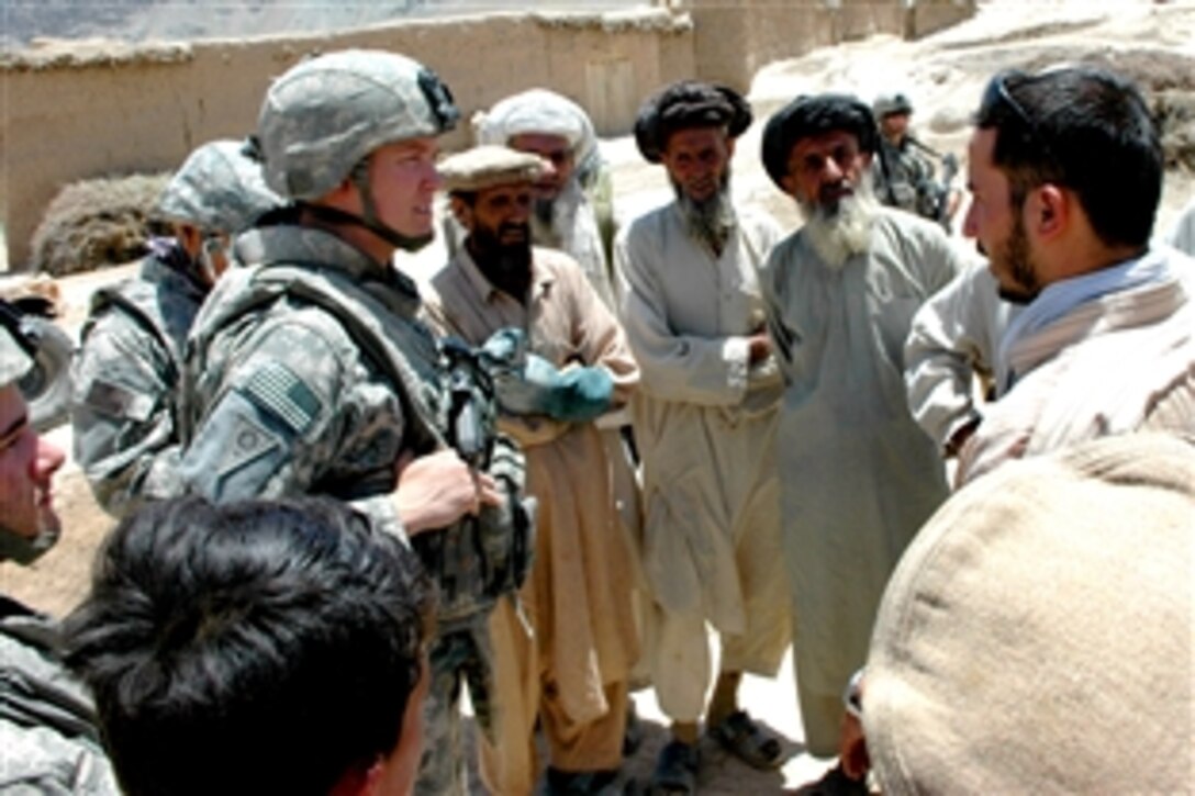 U.S. Army Capt. Steve H. Kaiser discusses future project plans with the community development council in the remote village of Shawo Kalay, June 24, 2008. Kaiser is a civil affairs leader for the Kapisa and Parwan provicial reconstruction team on Bagram Airfield.
