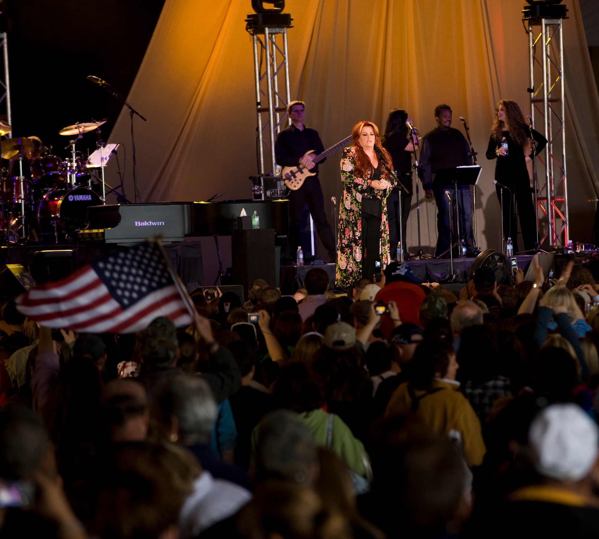 ELMENDORF AIR FORCE BASE ALASKA -Country Singer Wynonna Judd performs a free concert for the members of the military and Alaska crowd in Hanger 2 during "Alaska's Concert for the Military" June 27, as part of the Alaska's 50th Statehood celebration. (U.S Air Force photo byTech. Sgt. Alan Port)