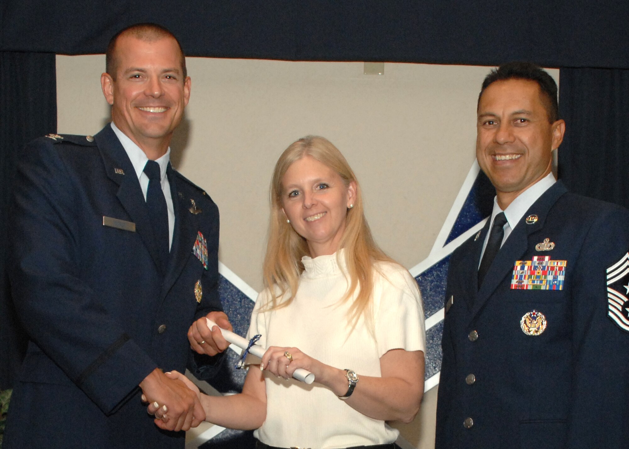 Holloman Air Force Base honors volunteers during the annual Volunteer Recognition Ceremony, June 27 at the Desert Sands Enlisted Club Holloman at Air Force Base, N.M. The ceremony is held to recognize those who volunteered between April 2007 and April 2008. This year the volunteers contributed more than 24,350 hours, which would equate to $158,321,00 if working for minimum wage. The Volunteers spent time at various places and events toinclude; the Holloman AFB Chapel, medical group, Boys and Girls Scouts, Thrift Shop, Airman's Attic, Youth and Teen Center Sports Program, Day of Caring, 572- Ride, Highway Clean-up, Special Oplymics, Big Brothers and BigSisters and many more.(U.S. Air Force photo/ SrA Tiffany Trojca)