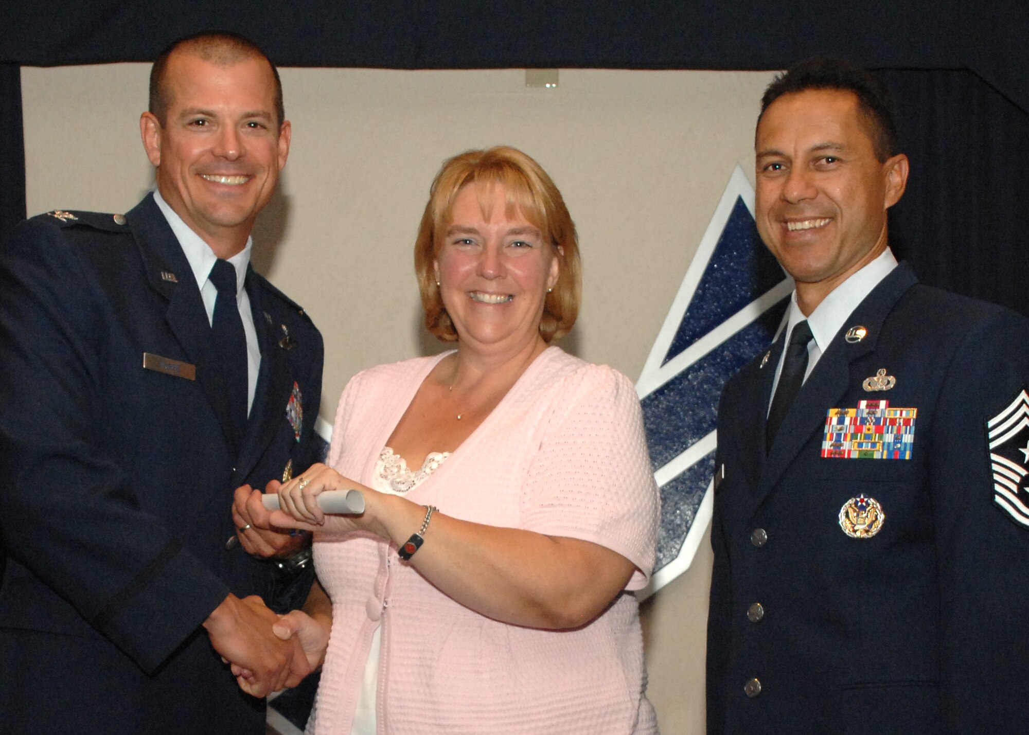 Holloman Air Force Base honors volunteers during the annual Volunteer Recognition Ceremony, June 27 at the Desert Sands Enlisted Club Holloman at Air Force Base, N.M. The ceremony is held to recognize those who volunteered between April 2007 and April 2008. This year the volunteers contributed more than 24,350 hours, which would equate to $158,321,00 if working for minimum wage. The Volunteers spent time at various places and events toinclude; the Holloman AFB Chapel, medical group, Boys and Girls Scouts, Thrift Shop, Airman's Attic, Youth and Teen Center Sports Program, Day of Caring, 572- Ride, Highway Clean-up, Special Oplymics, Big Brothers and BigSisters and many more.(U.S. Air Force photo/ SrA Tiffany Trojca)