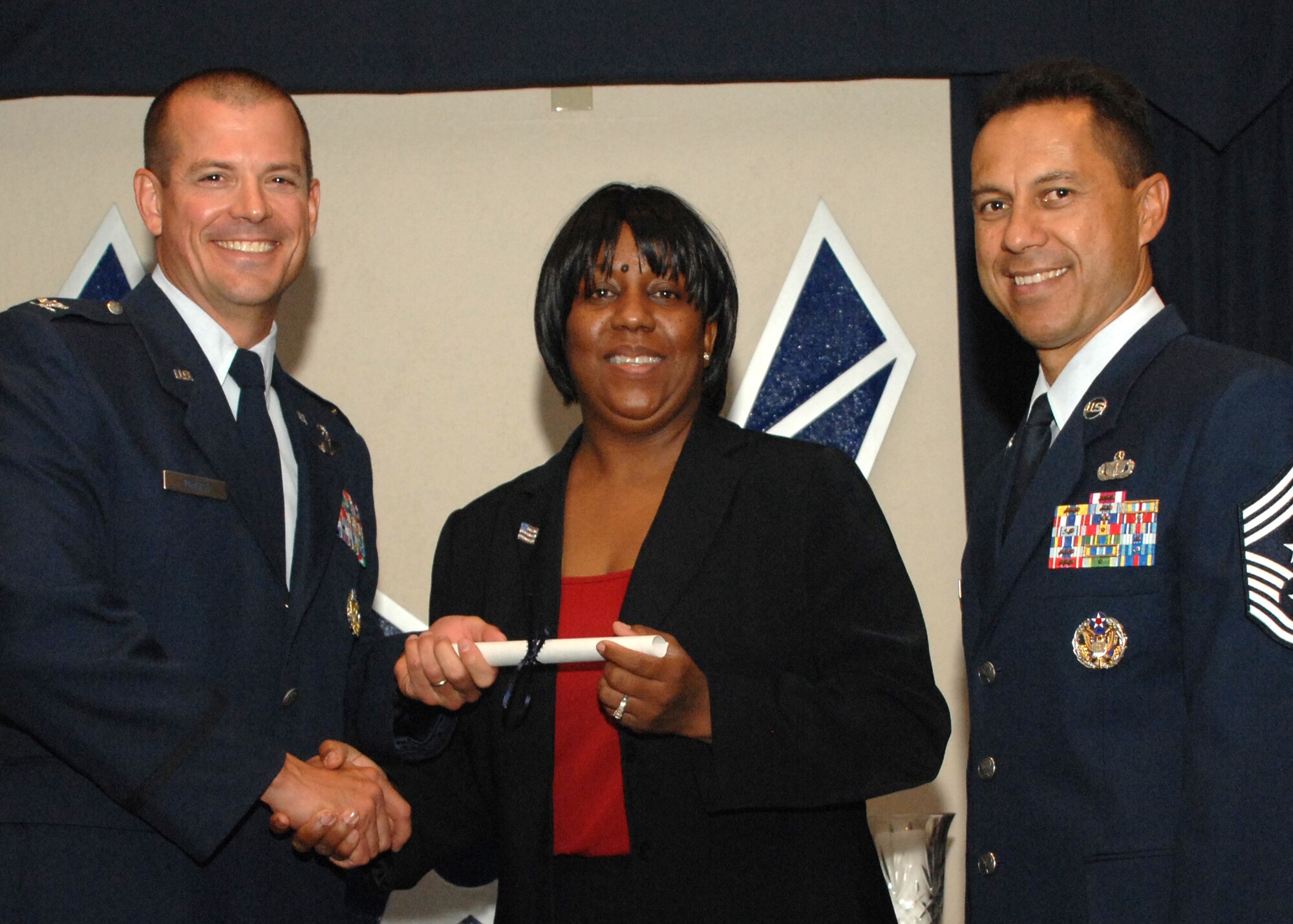 Holloman Air Force Base honors volunteers during the annual Volunteer Recognition Ceremony, June 27 at the Desert Sands Enlisted Club Holloman at Air Force Base, N.M. The ceremony is held to recognize those who volunteered between April 2007 and April 2008. This year the volunteers contributed more than 24,350 hours, which would equate to $158,321,00 if working for minimum wage. The Volunteers spent time at various places and events toinclude; the Holloman AFB Chapel, medical group, Boys and Girls Scouts, Thrift Shop, Airman's Attic, Youth and Teen Center Sports Program, Day of Caring, 572- Ride, Highway Clean-up, Special Oplymics, Big Brothers and BigSisters and many more.(U.S. Air Force photo/ SrA Tiffany Trojca)