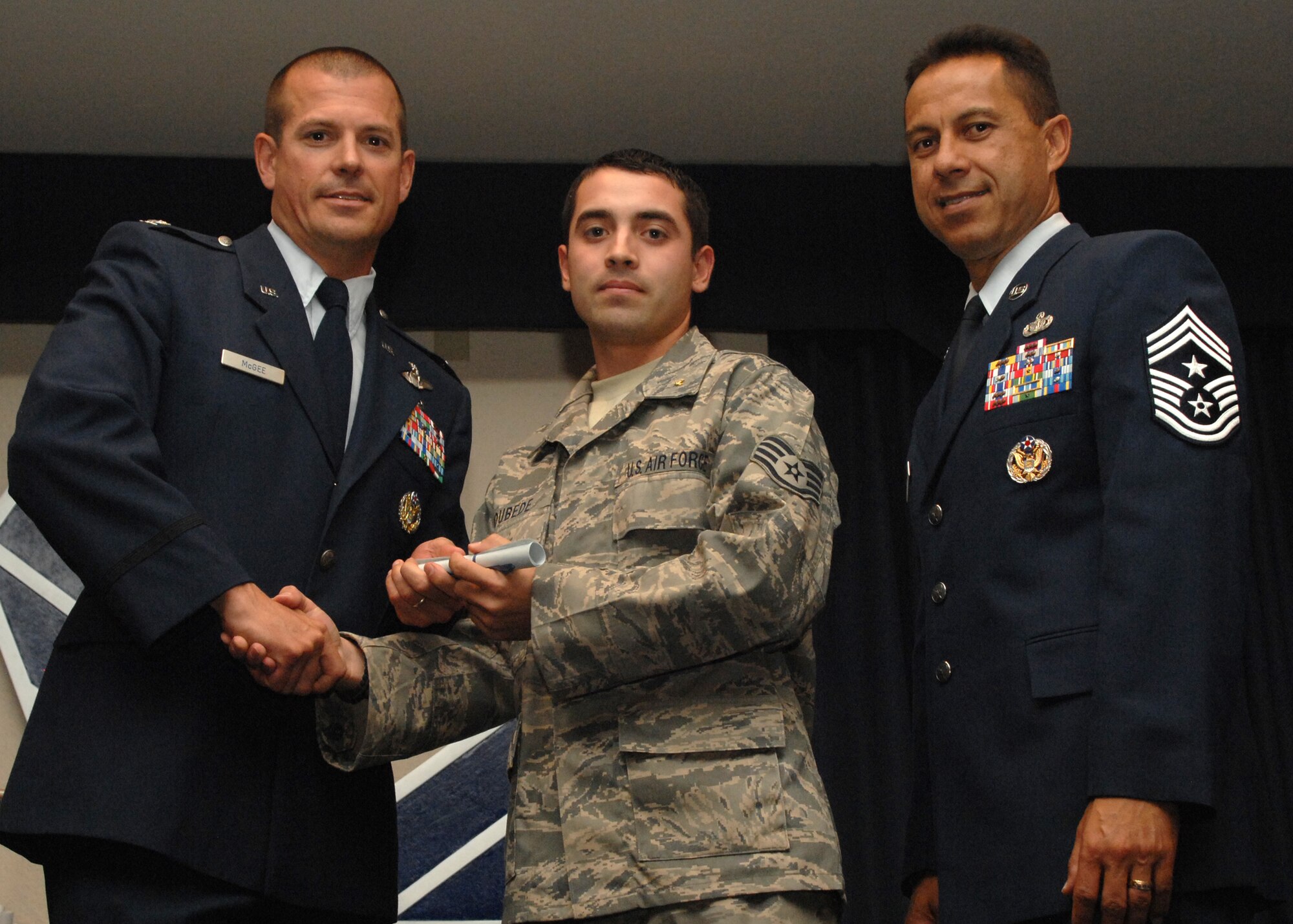 Holloman Air Force Base honors volunteers during the annual Volunteer Recognition Ceremony, June 27 at the Desert Sands Enlisted Club Holloman at Air Force Base, N.M. The ceremony is held to recognize those who volunteered between April 2007 and April 2008. This year the volunteers contributed more than 24,350 hours, which would equate to $158,321,00 if working for minimum wage. The Volunteers spent time at various places and events toinclude; the Holloman AFB Chapel, medical group, Boys and Girls Scouts, Thrift Shop, Airman's Attic, Youth and Teen Center Sports Program, Day of Caring, 572- Ride, Highway Clean-up, Special Oplymics, Big Brothers and BigSisters and many more.(U.S. Air Force photo/ SrA Tiffany Trojca)