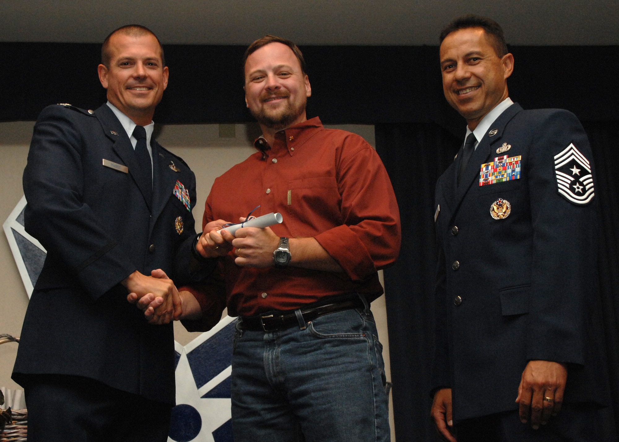 Holloman Air Force Base honors volunteers during the annual Volunteer Recognition Ceremony, June 27 at the Desert Sands Enlisted Club Holloman at Air Force Base, N.M. The ceremony is held to recognize those who volunteered between April 2007 and April 2008. This year the volunteers contributed more than 24,350 hours, which would equate to $158,321,00 if working for minimum wage. The Volunteers spent time at various places and events toinclude; the Holloman AFB Chapel, medical group, Boys and Girls Scouts, Thrift Shop, Airman's Attic, Youth and Teen Center Sports Program, Day of Caring, 572- Ride, Highway Clean-up, Special Oplymics, Big Brothers and BigSisters and many more.(U.S. Air Force photo/ SrA Tiffany Trojca)