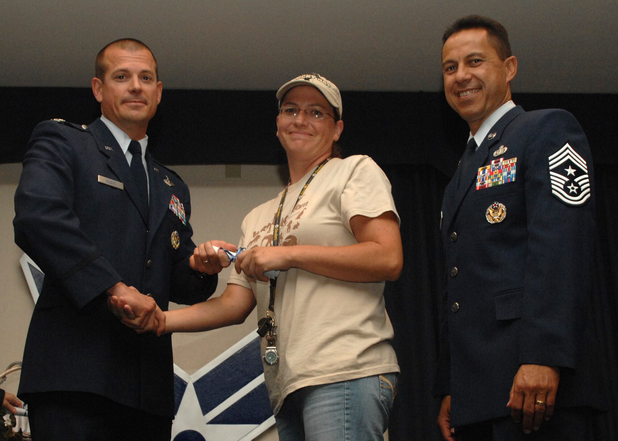 Holloman Air Force Base honors volunteers during the annual Volunteer Recognition Ceremony, June 27 at the Desert Sands Enlisted Club Holloman at Air Force Base, N.M. The ceremony is held to recognize those who volunteered between April 2007 and April 2008. This year the volunteers contributed more than 24,350 hours, which would equate to $158,321,00 if working for minimum wage. The Volunteers spent time at various places and events toinclude; the Holloman AFB Chapel, medical group, Boys and Girls Scouts, Thrift Shop, Airman's Attic, Youth and Teen Center Sports Program, Day of Caring, 572- Ride, Highway Clean-up, Special Oplymics, Big Brothers and BigSisters and many more.(U.S. Air Force photo/ SrA Tiffany Trojca)