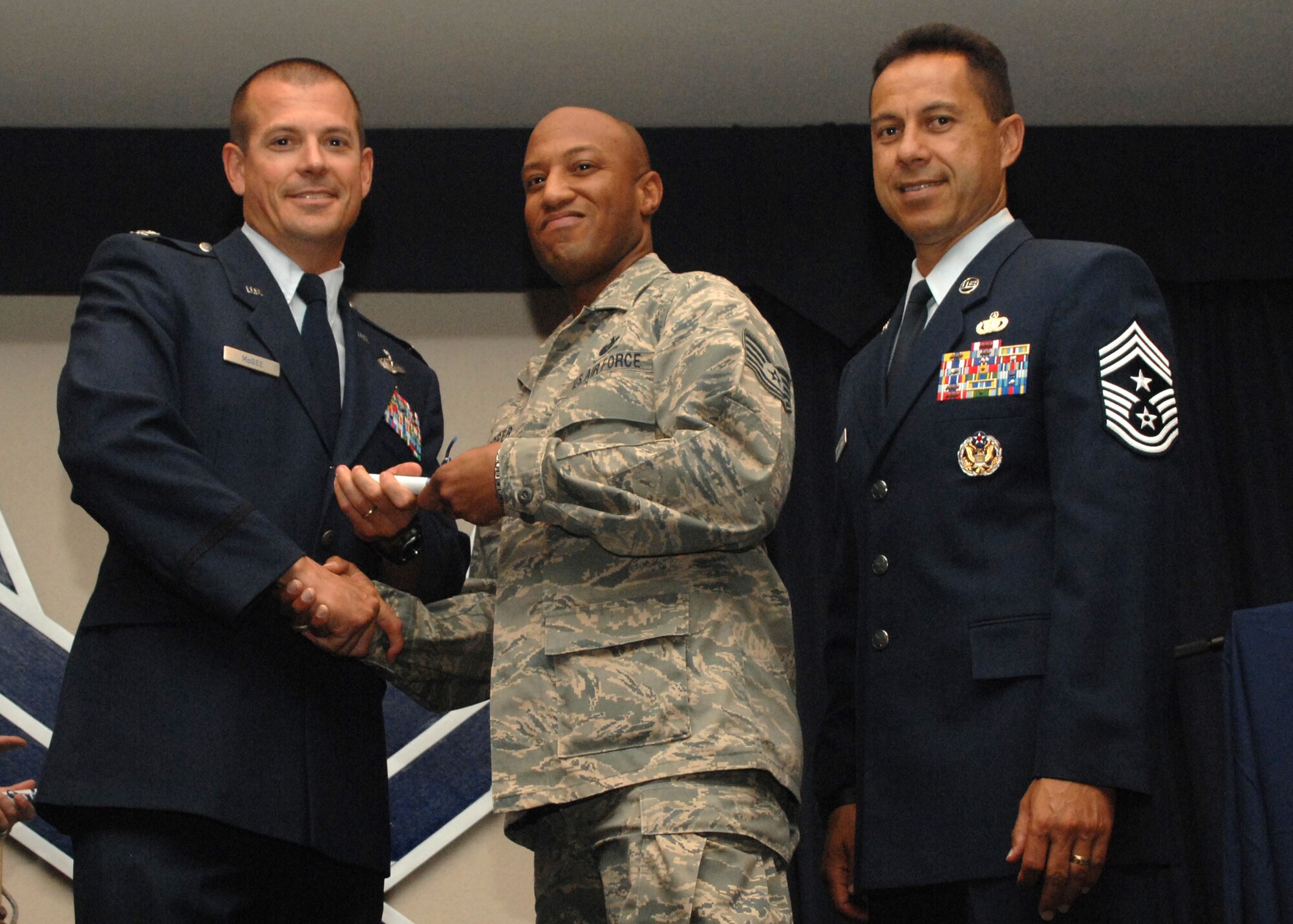 Holloman Air Force Base honors volunteers during the annual Volunteer Recognition Ceremony, June 27 at the Desert Sands Enlisted Club Holloman at Air Force Base, N.M. The ceremony is held to recognize those who volunteered between April 2007 and April 2008. This year the volunteers contributed more than 24,350 hours, which would equate to $158,321,00 if working for minimum wage. The Volunteers spent time at various places and events toinclude; the Holloman AFB Chapel, medical group, Boys and Girls Scouts, Thrift Shop, Airman's Attic, Youth and Teen Center Sports Program, Day of Caring, 572- Ride, Highway Clean-up, Special Oplymics, Big Brothers and BigSisters and many more.(U.S. Air Force photo/ SrA Tiffany Trojca)