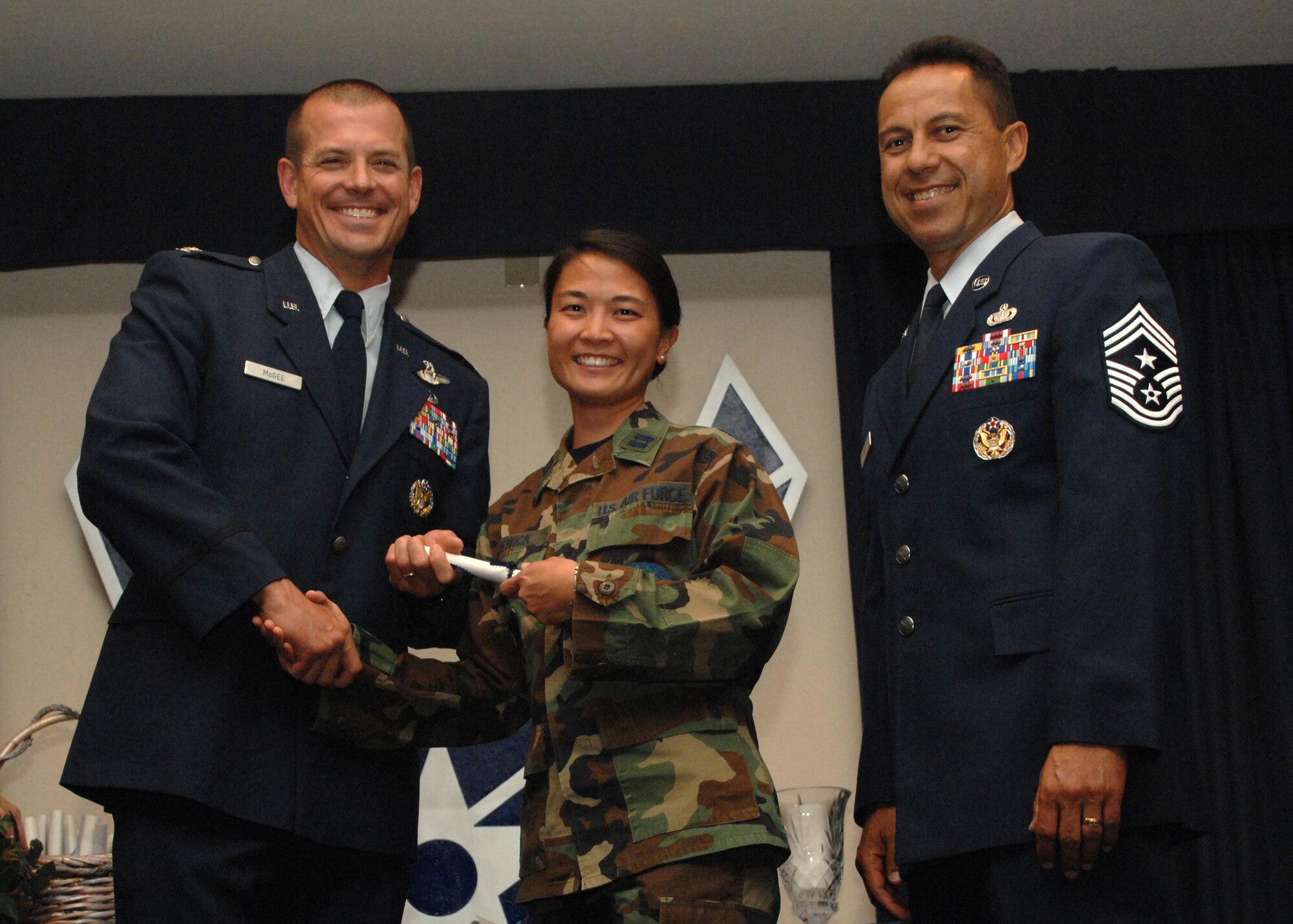 Holloman Air Force Base honors volunteers during the annual Volunteer Recognition Ceremony, June 27 at the Desert Sands Enlisted Club Holloman at Air Force Base, N.M. The ceremony is held to recognize those who volunteered between April 2007 and April 2008. This year the volunteers contributed more than 24,350 hours, which would equate to $158,321,00 if working for minimum wage. The Volunteers spent time at various places and events toinclude; the Holloman AFB Chapel, medical group, Boys and Girls Scouts, Thrift Shop, Airman's Attic, Youth and Teen Center Sports Program, Day of Caring, 572- Ride, Highway Clean-up, Special Oplymics, Big Brothers and BigSisters and many more.(U.S. Air Force photo/ SrA Tiffany Trojca)