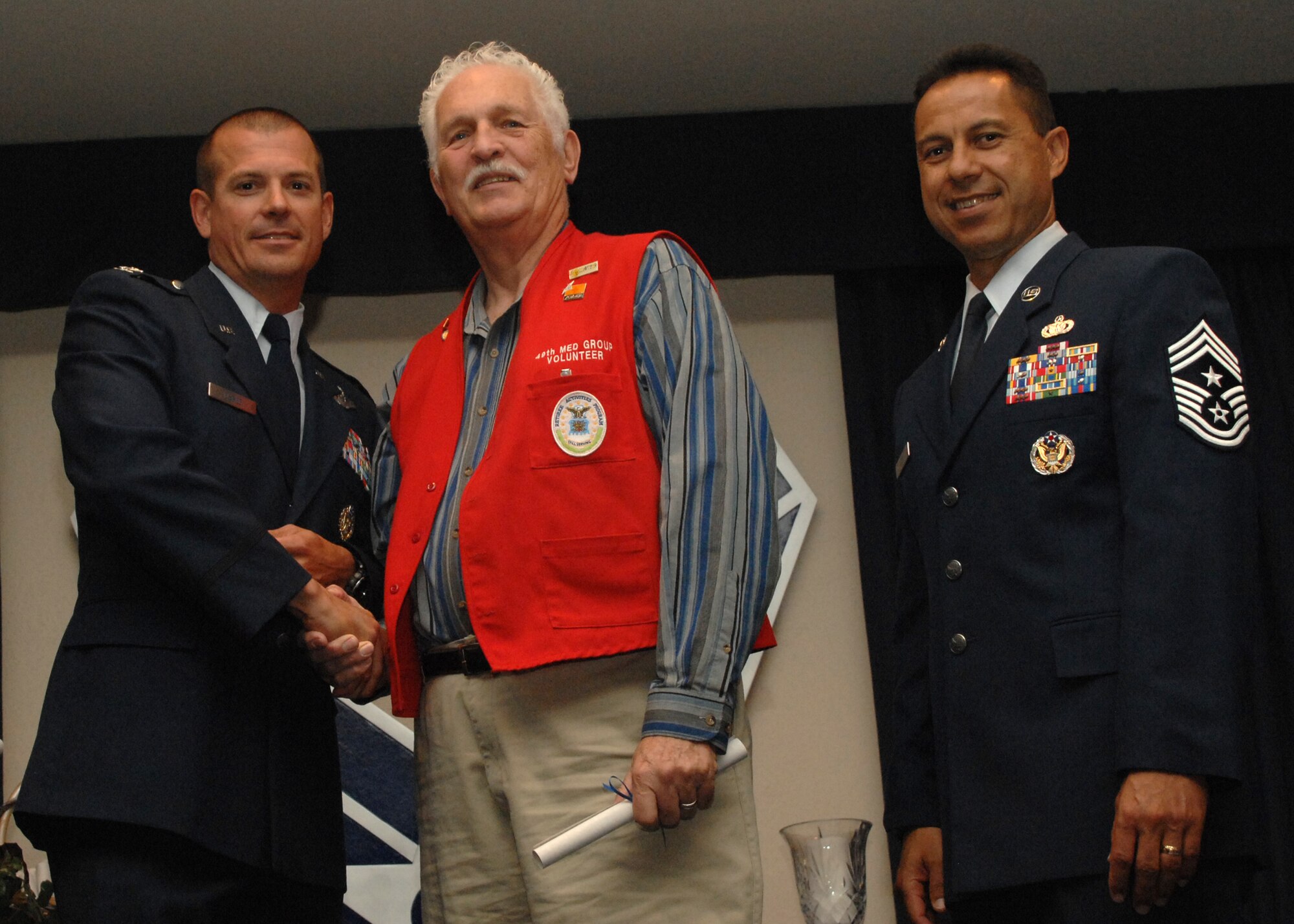 Holloman Air Force Base honors volunteers during the annual Volunteer Recognition Ceremony, June 27 at the Desert Sands Enlisted Club Holloman at Air Force Base, N.M. The ceremony is held to recognize those who volunteered between April 2007 and April 2008. This year the volunteers contributed more than 24,350 hours, which would equate to $158,321,00 if working for minimum wage. The Volunteers spent time at various places and events toinclude; the Holloman AFB Chapel, medical group, Boys and Girls Scouts, Thrift Shop, Airman's Attic, Youth and Teen Center Sports Program, Day of Caring, 572- Ride, Highway Clean-up, Special Oplymics, Big Brothers and BigSisters and many more.(U.S. Air Force photo/ SrA Tiffany Trojca)