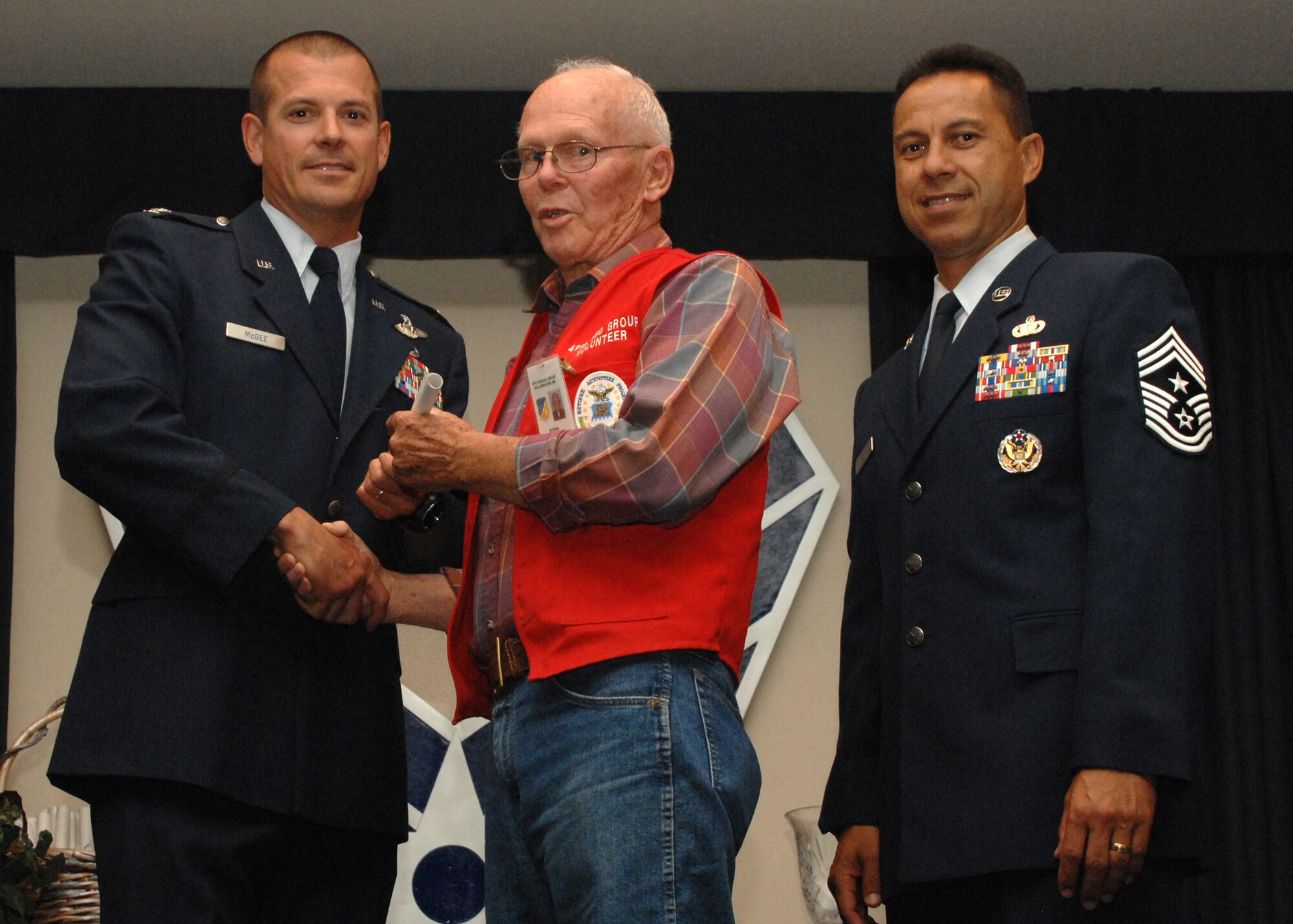 Holloman Air Force Base honors volunteers during the annual Volunteer Recognition Ceremony, June 27 at the Desert Sands Enlisted Club Holloman at Air Force Base, N.M. The ceremony is held to recognize those who volunteered between April 2007 and April 2008. This year the volunteers contributed more than 24,350 hours, which would equate to $158,321,00 if working for minimum wage. The Volunteers spent time at various places and events toinclude; the Holloman AFB Chapel, medical group, Boys and Girls Scouts, Thrift Shop, Airman's Attic, Youth and Teen Center Sports Program, Day of Caring, 572- Ride, Highway Clean-up, Special Oplymics, Big Brothers and BigSisters and many more.(U.S. Air Force photo/ SrA Tiffany Trojca)