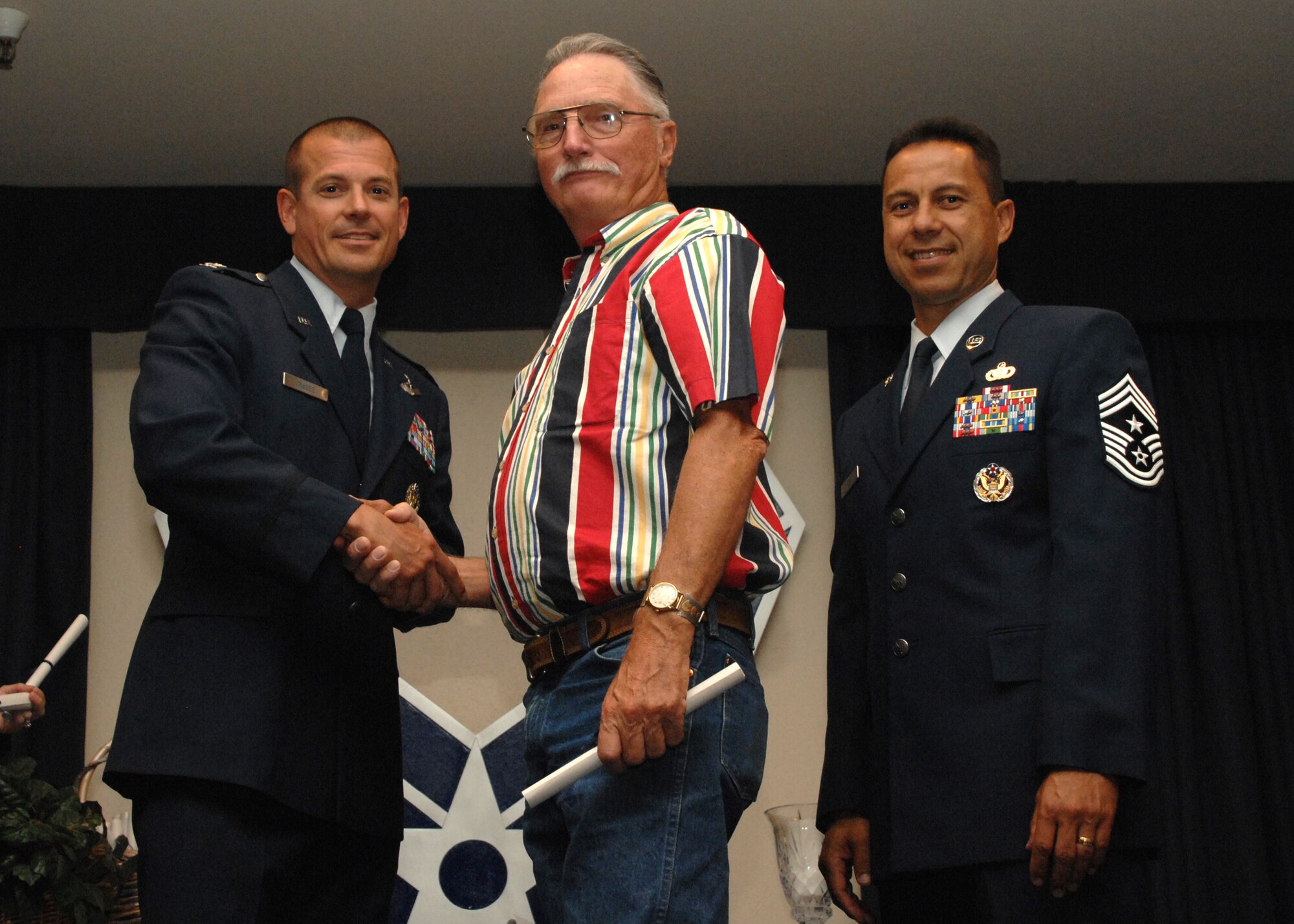 Holloman Air Force Base honors volunteers during the annual Volunteer Recognition Ceremony, June 27 at the Desert Sands Enlisted Club Holloman at Air Force Base, N.M. The ceremony is held to recognize those who volunteered between April 2007 and April 2008. This year the volunteers contributed more than 24,350 hours, which would equate to $158,321,00 if working for minimum wage. The Volunteers spent time at various places and events toinclude; the Holloman AFB Chapel, medical group, Boys and Girls Scouts, Thrift Shop, Airman's Attic, Youth and Teen Center Sports Program, Day of Caring, 572- Ride, Highway Clean-up, Special Oplymics, Big Brothers and BigSisters and many more.(U.S. Air Force photo/ SrA Tiffany Trojca)
