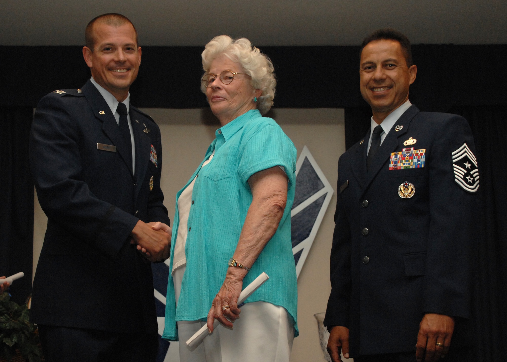 Holloman Air Force Base honors volunteers during the annual Volunteer Recognition Ceremony, June 27 at the Desert Sands Enlisted Club Holloman at Air Force Base, N.M. The ceremony is held to recognize those who volunteered between April 2007 and April 2008. This year the volunteers contributed more than 24,350 hours, which would equate to $158,321,00 if working for minimum wage. The Volunteers spent time at various places and events toinclude; the Holloman AFB Chapel, medical group, Boys and Girls Scouts, Thrift Shop, Airman's Attic, Youth and Teen Center Sports Program, Day of Caring, 572- Ride, Highway Clean-up, Special Oplymics, Big Brothers and BigSisters and many more.(U.S. Air Force photo/ SrA Tiffany Trojca)