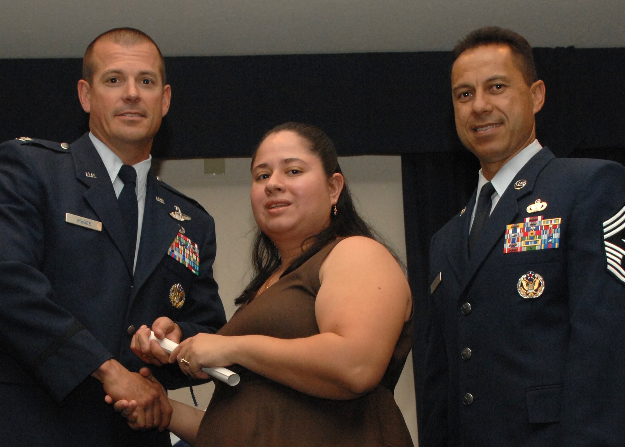 Holloman Air Force Base honors volunteers during the annual Volunteer Recognition Ceremony, June 27 at the Desert Sands Enlisted Club Holloman at Air Force Base, N.M. The ceremony is held to recognize those who volunteered between April 2007 and April 2008. This year the volunteers contributed more than 24,350 hours, which would equate to $158,321,00 if working for minimum wage. The Volunteers spent time at various places and events toinclude; the Holloman AFB Chapel, medical group, Boys and Girls Scouts, Thrift Shop, Airman's Attic, Youth and Teen Center Sports Program, Day of Caring, 572- Ride, Highway Clean-up, Special Oplymics, Big Brothers and BigSisters and many more.(U.S. Air Force photo/ SrA Tiffany Trojca)