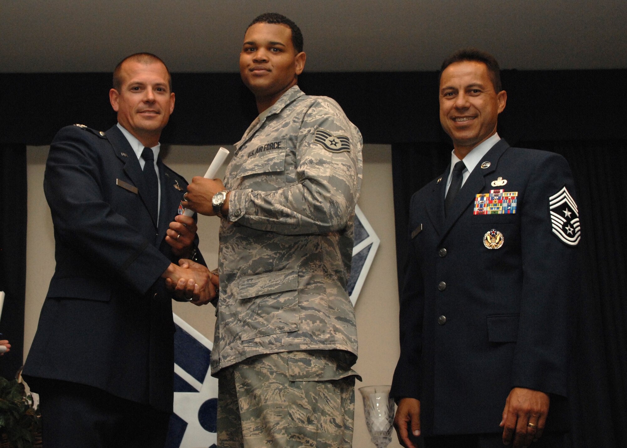 Holloman Air Force Base honors volunteers during the annual Volunteer Recognition Ceremony, June 27 at the Desert Sands Enlisted Club Holloman at Air Force Base, N.M. The ceremony is held to recognize those who volunteered between April 2007 and April 2008. This year the volunteers contributed more than 24,350 hours, which would equate to $158,321,00 if working for minimum wage. The Volunteers spent time at various places and events toinclude; the Holloman AFB Chapel, medical group, Boys and Girls Scouts, Thrift Shop, Airman's Attic, Youth and Teen Center Sports Program, Day of Caring, 572- Ride, Highway Clean-up, Special Oplymics, Big Brothers and BigSisters and many more.(U.S. Air Force photo/ SrA Tiffany Trojca)