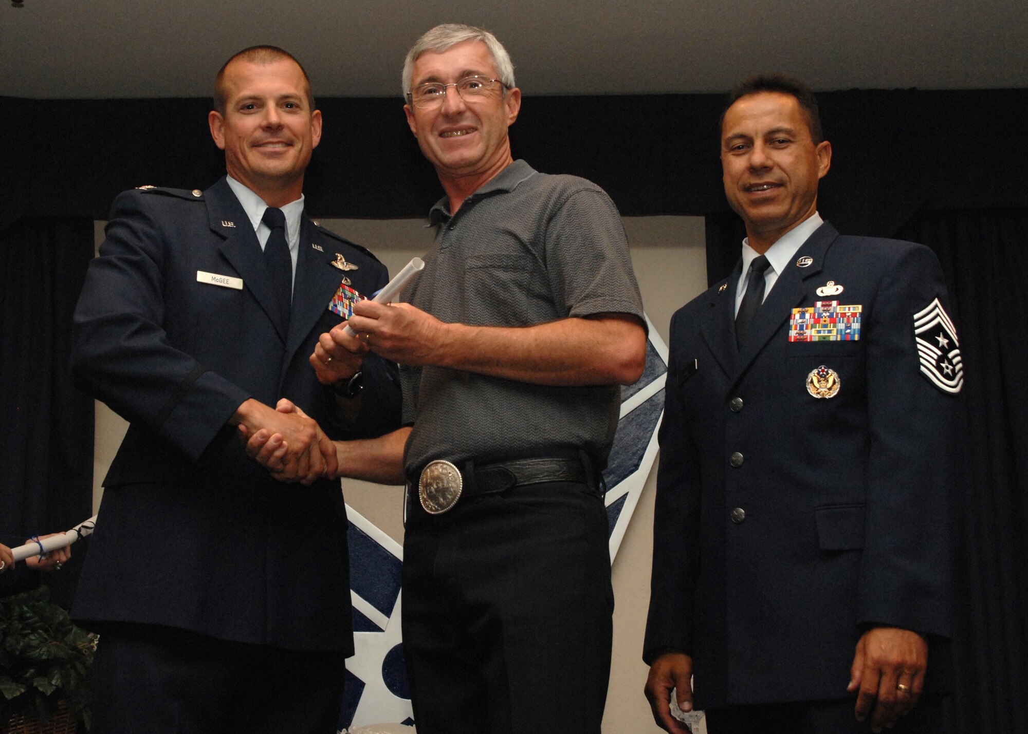 Holloman Air Force Base honors volunteers during the annual Volunteer Recognition Ceremony, June 27 at the Desert Sands Enlisted Club Holloman at Air Force Base, N.M. The ceremony is held to recognize those who volunteered between April 2007 and April 2008. This year the volunteers contributed more than 24,350 hours, which would equate to $158,321,00 if working for minimum wage. The Volunteers spent time at various places and events toinclude; the Holloman AFB Chapel, medical group, Boys and Girls Scouts, Thrift Shop, Airman's Attic, Youth and Teen Center Sports Program, Day of Caring, 572- Ride, Highway Clean-up, Special Oplymics, Big Brothers and BigSisters and many more.(U.S. Air Force photo/ SrA Tiffany Trojca)